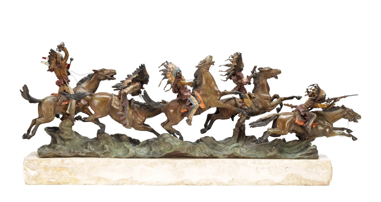 CARL KAUBA (AUSTRIAN, 1865-1922) A LARGE COLD PAINTED BRONZE FIGURAL GROUP OF NATIVE AMERICAN: CARL KAUBA (AUSTRIAN, 1865-1922) A LARGE COLD PAINTED BRONZE FIGURAL GROUP OF NATIVE AMERICAN WARRIORS ON HORSEBACK depicting a charging band on a naturalistic base, signed to the cast, the whole moun