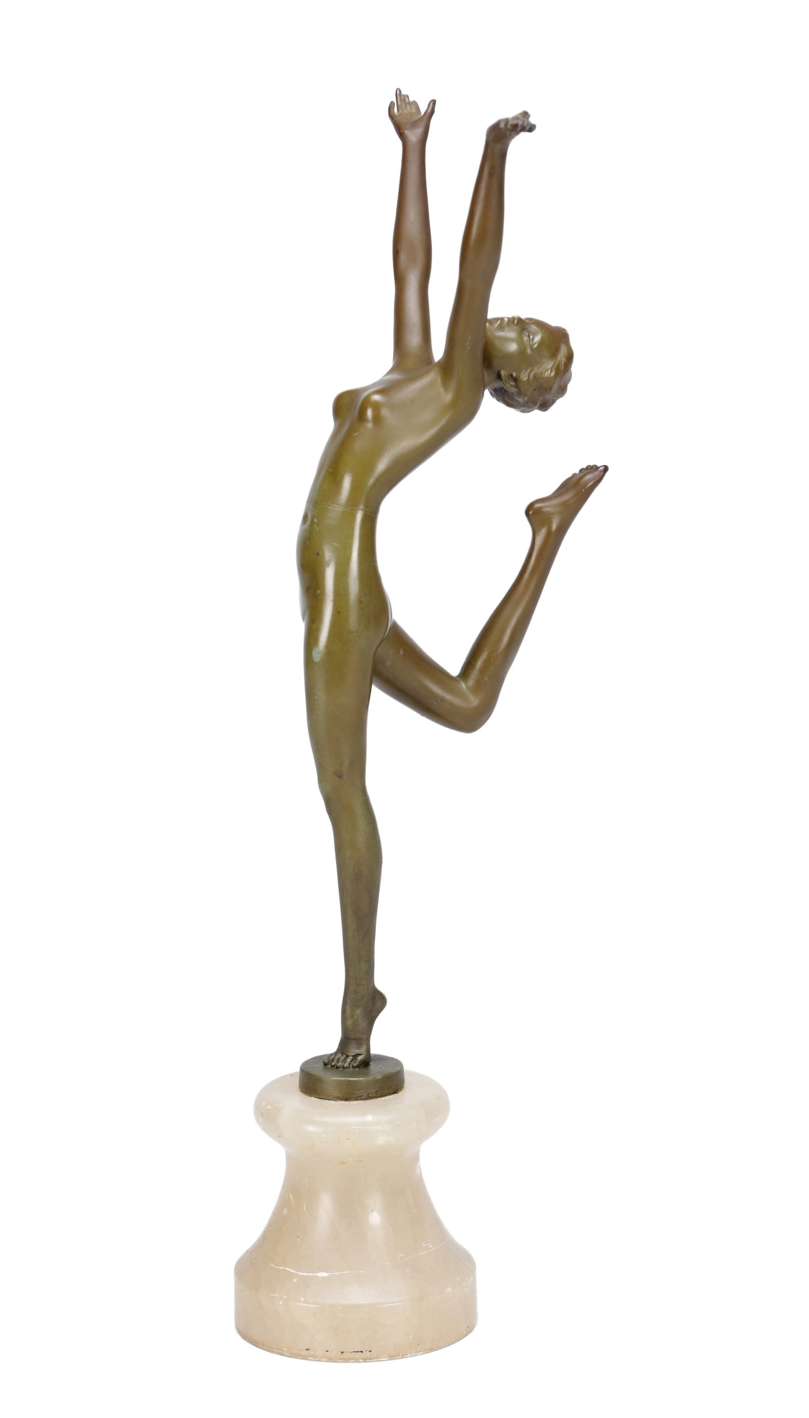 AN ART DECO PATINATED BRONZE FIGURE OF A DANCER ON AN ONYX BASE: AN ART DECO PATINATED BRONZE FIGURE OF A DANCER ON AN ONYX BASE the nude poised en pointe with arms aloft and one leg raised, on a small circular socle and waisted cream onyx plinth. (40cm high)