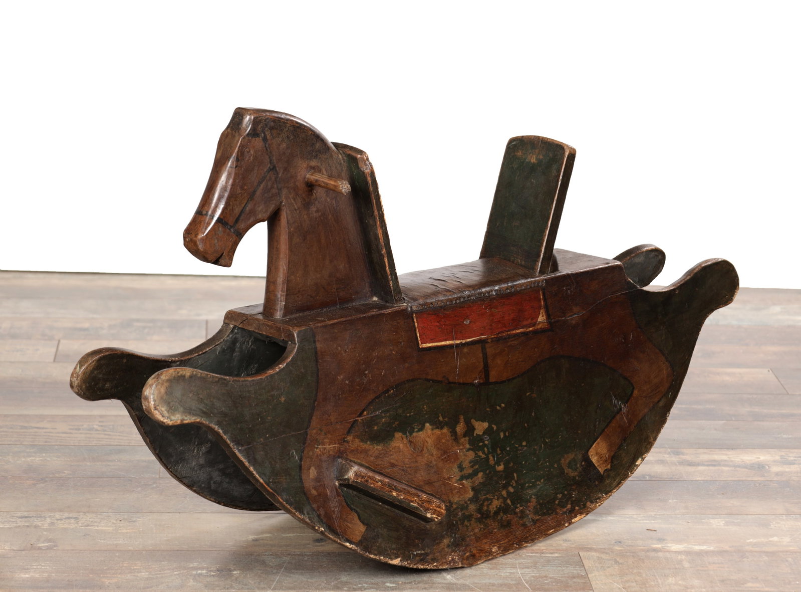 A 19TH CENTURY CARVED AND PAINTED WOOD ROCKING HORSE (1 of 7)