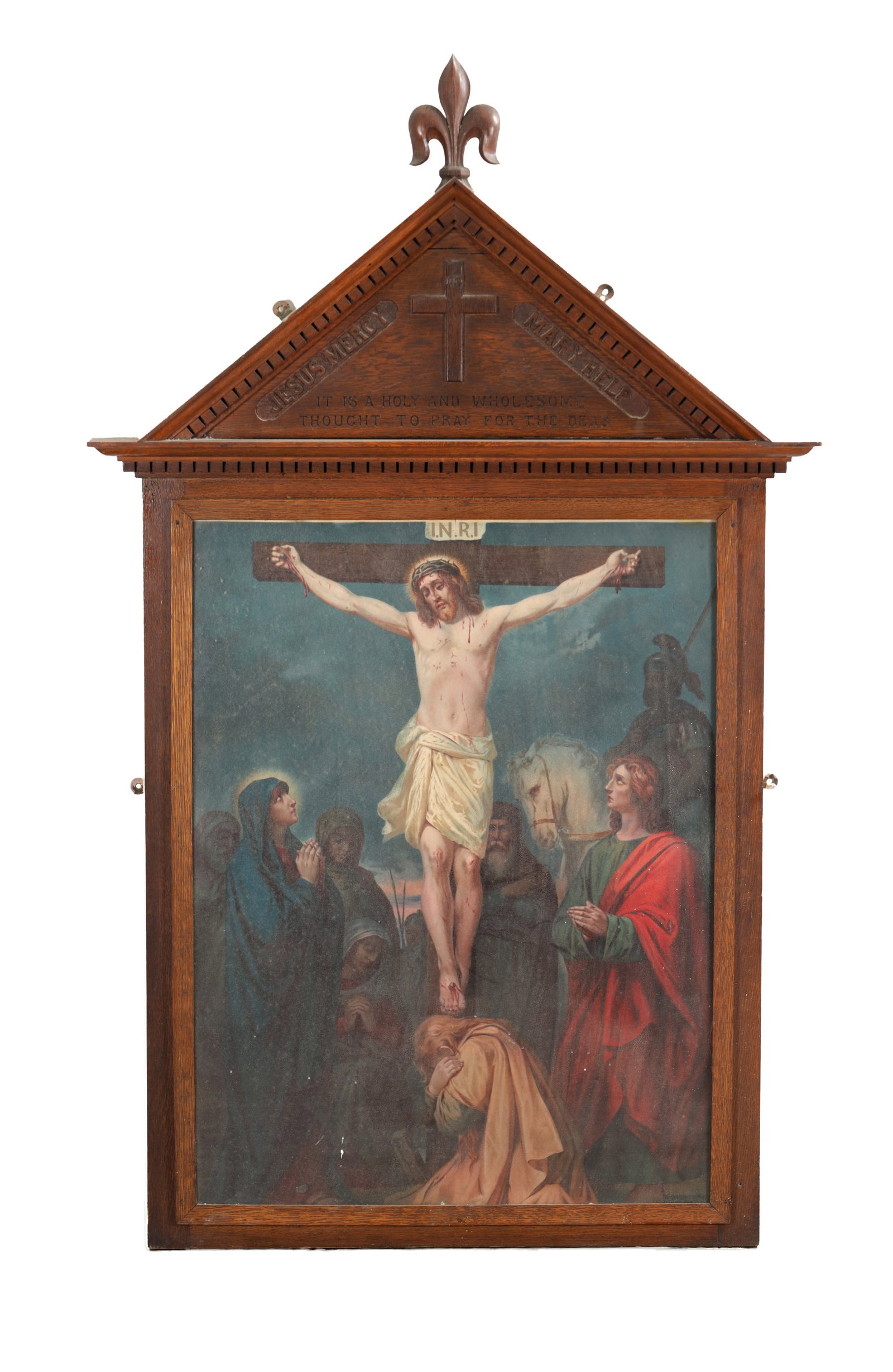 A 19TH CENTURY FLEMISH STATIONS OF THE CROSS LITHOGRAPH IN A CARVED OAK FRAME: A 19TH CENTURY FLEMISH STATIONS OF THE CROSS LITHOGRAPH IN A CARVED OAK FRAME with a triangular pediment carved with a cross and inscriptions and surmounted by a fleur de lys finial, the image