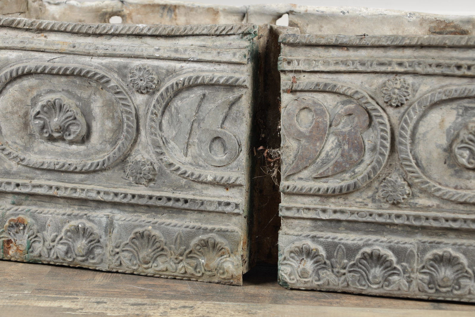 A LATE 17TH CENTURY RECTANGULAR LEAD PLANTER DATED 1693 - 8