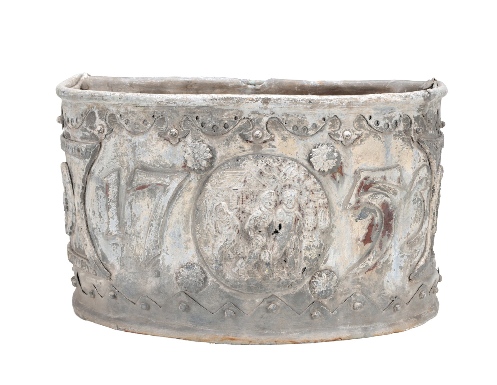 A MID 18TH CENTURY LEAD BOW FRONTED PLANTER DATED 1753: A MID 18TH CENTURY LEAD BOW FRONTED PLANTER DATED 1753 of oval bow fronted form cast with a scalloped rim border and studded lower band, the front with large relief numerals 17 and 53 flanking a