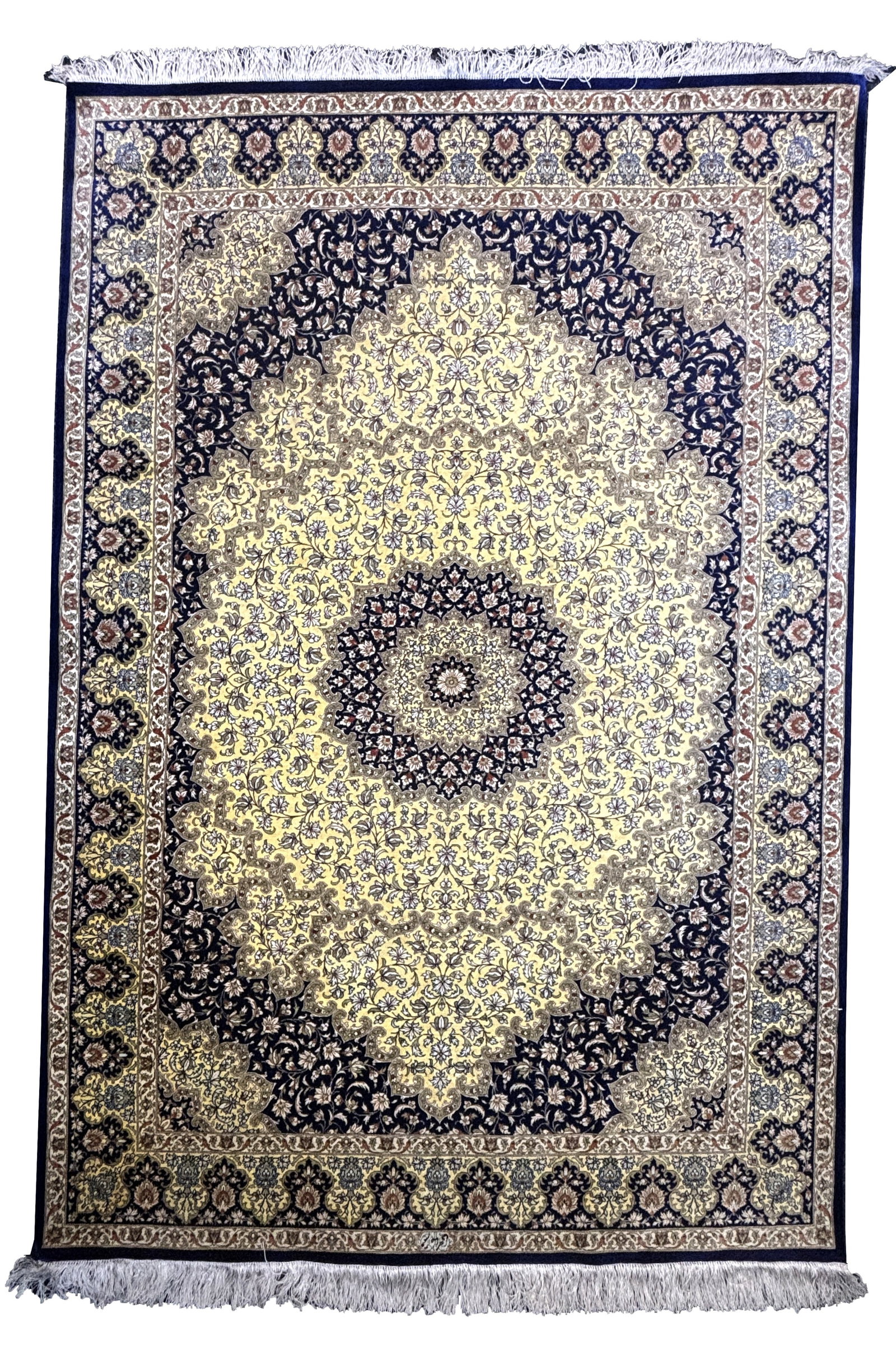A PERSIAN NAIN CARPET: A PERSIAN NAIN CARPET with a cream ground centred by a radiating rosette and lobed medallion within navy spandrels, all with scrolling vine and palmette decoration and enclosed by multiple floral