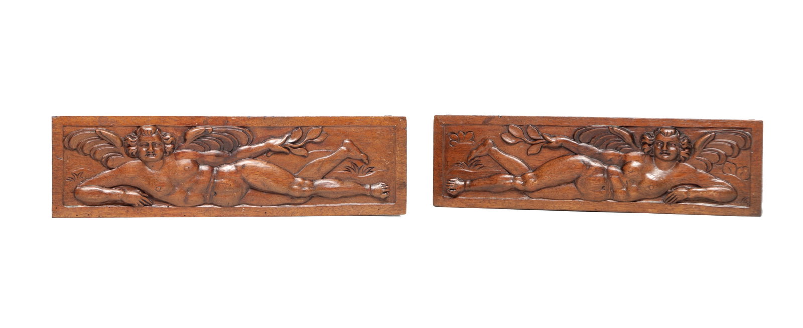 A PAIR OF 17TH CENTURY WALNUT WINGED CHERUB PANELS (1 of 7)
