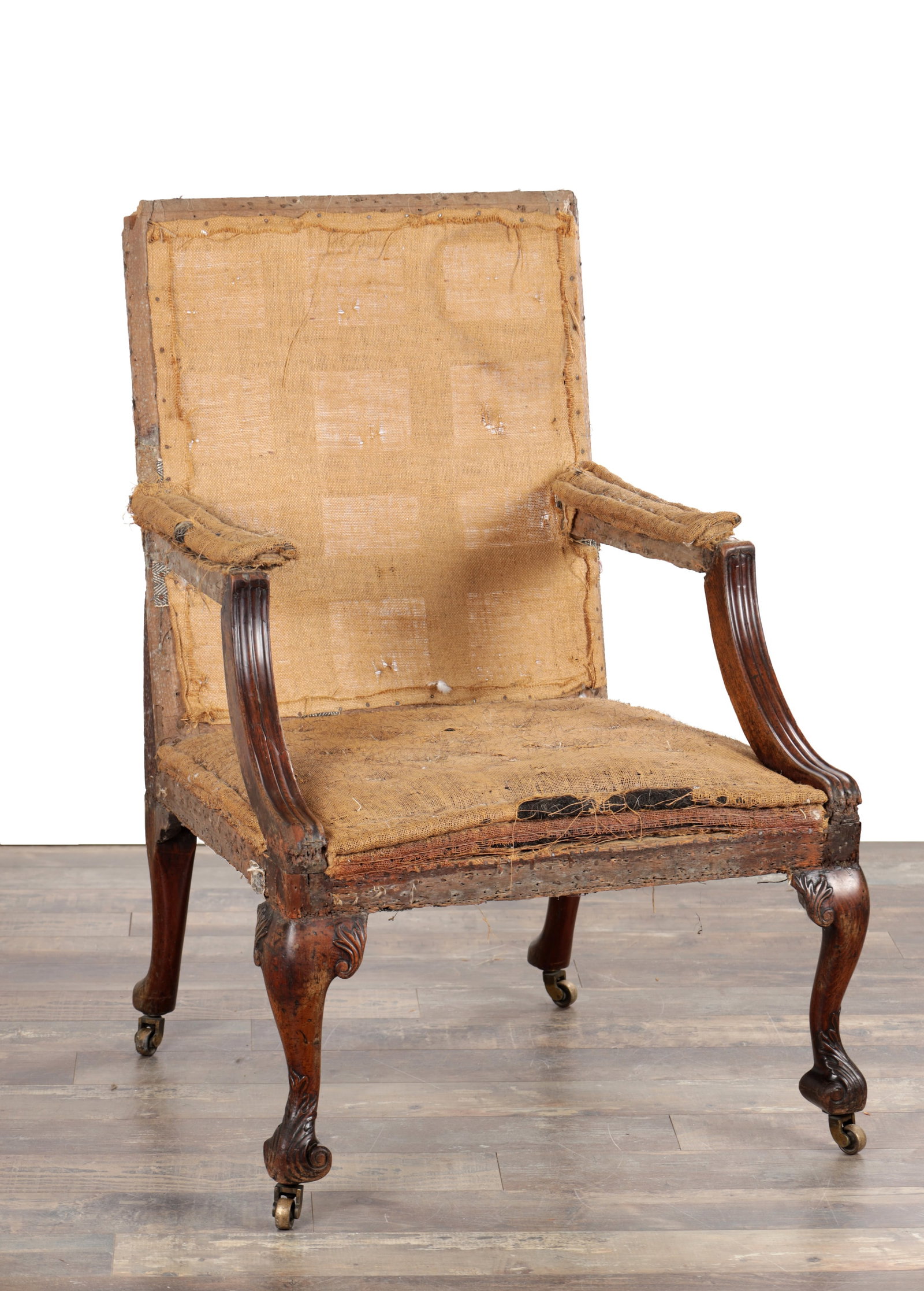 A GEORGE III CARVED MAHOGANY GAINSBOROUGH CHAIR (1 of 7)