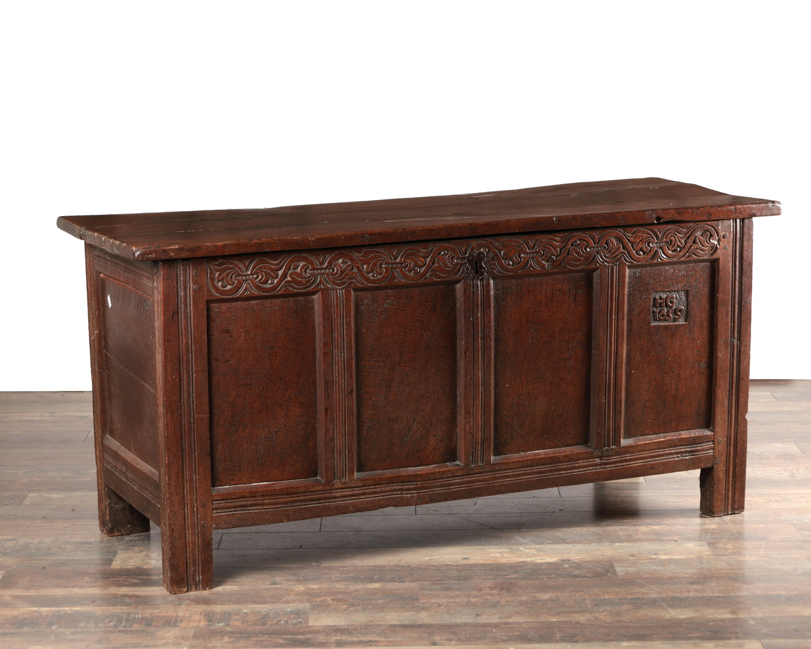 A 17TH CENTURY ENGLISH OAK COFFER INITIALLED HG AND DATED 1659 (1 of 9)