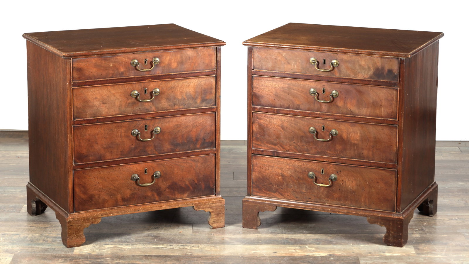 A PAIR OF GEORGE III MAHOGANY CHESTS OF DRAWERS (1 of 9)