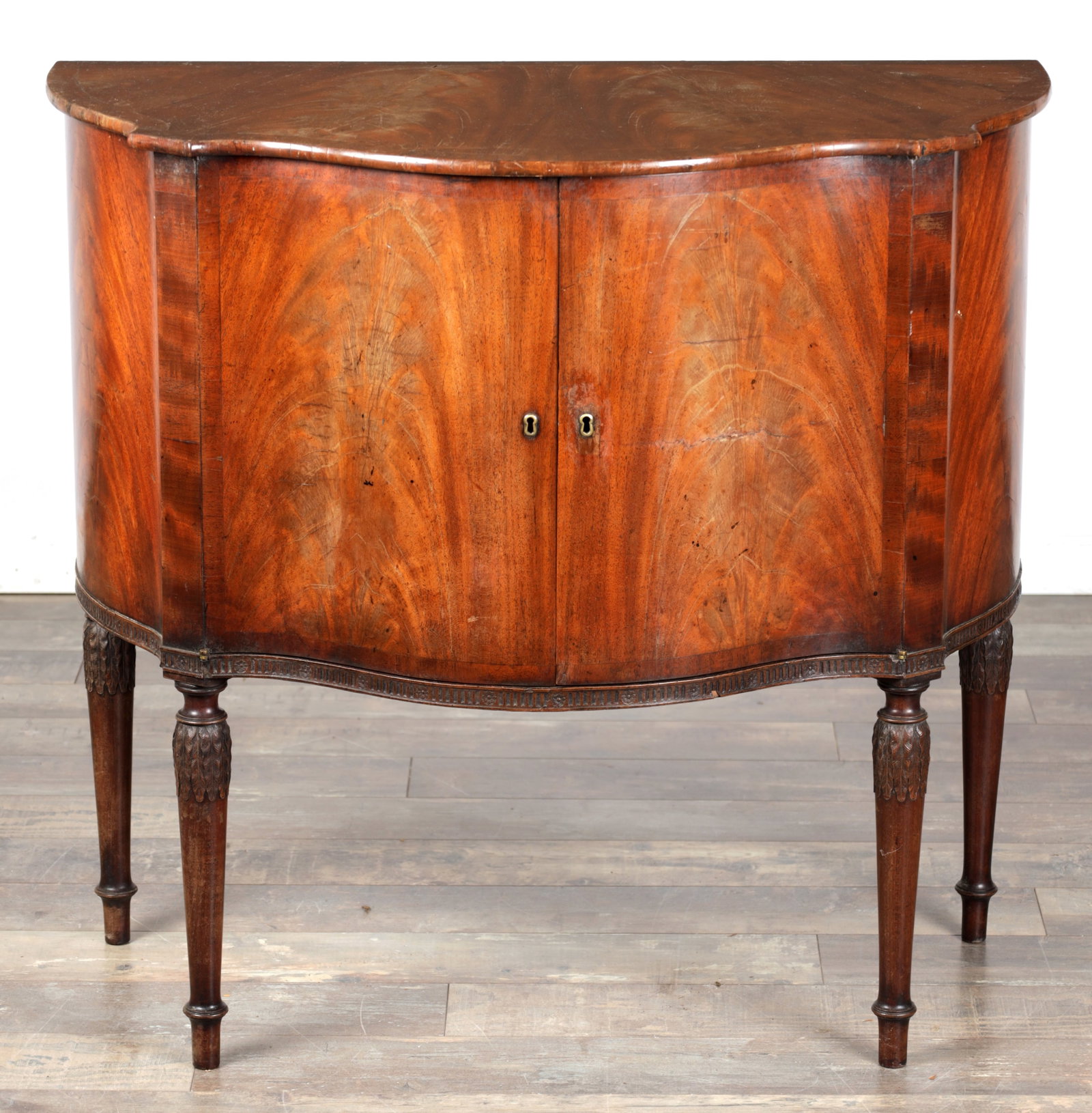 A GEORGE III MAHOGANY SERPENTINE SIDE CABINET (1 of 9)
