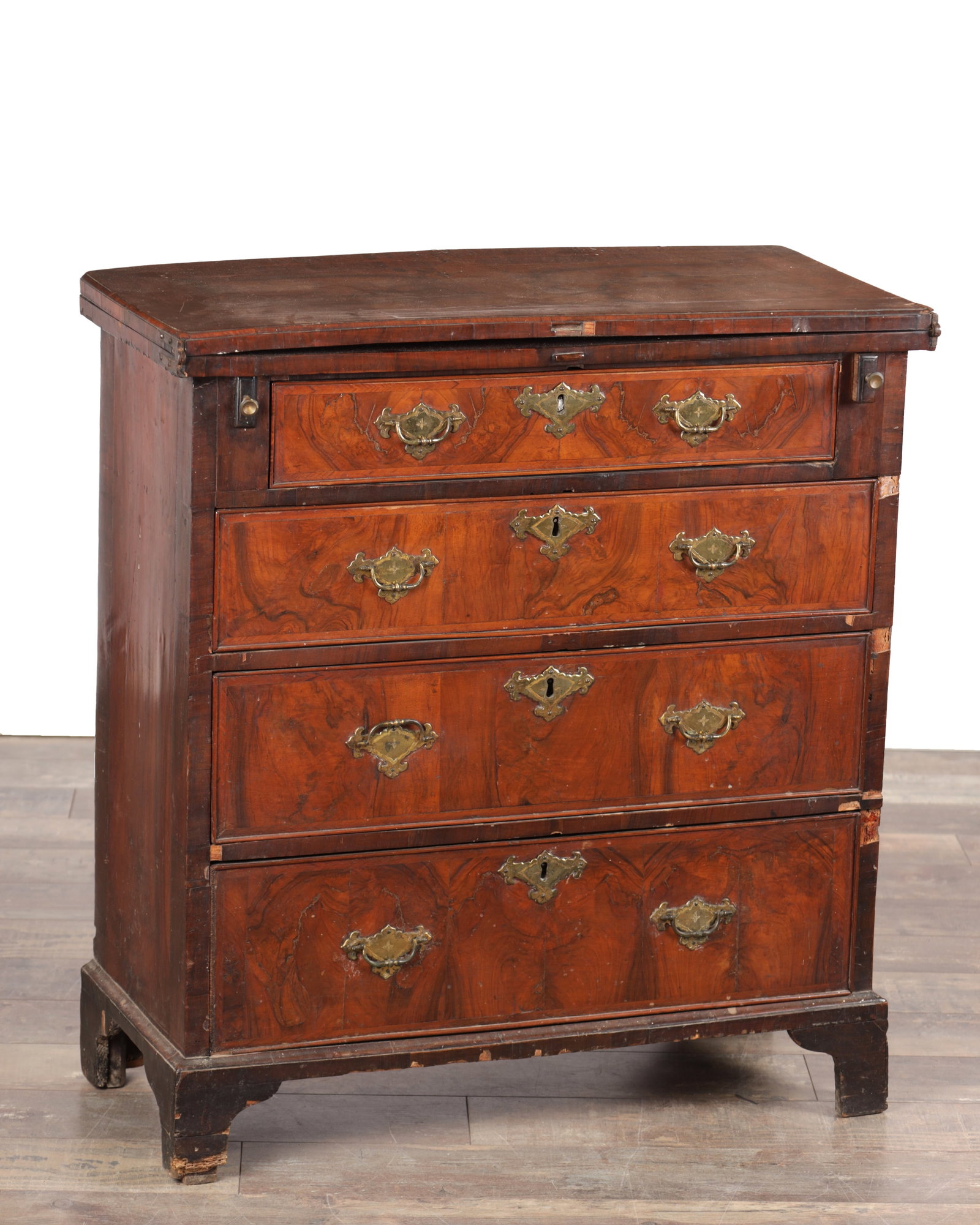 AN EARLY 18TH CENTURY FIGURED WALNUT BACHELOR'S CHEST (1 of 12)