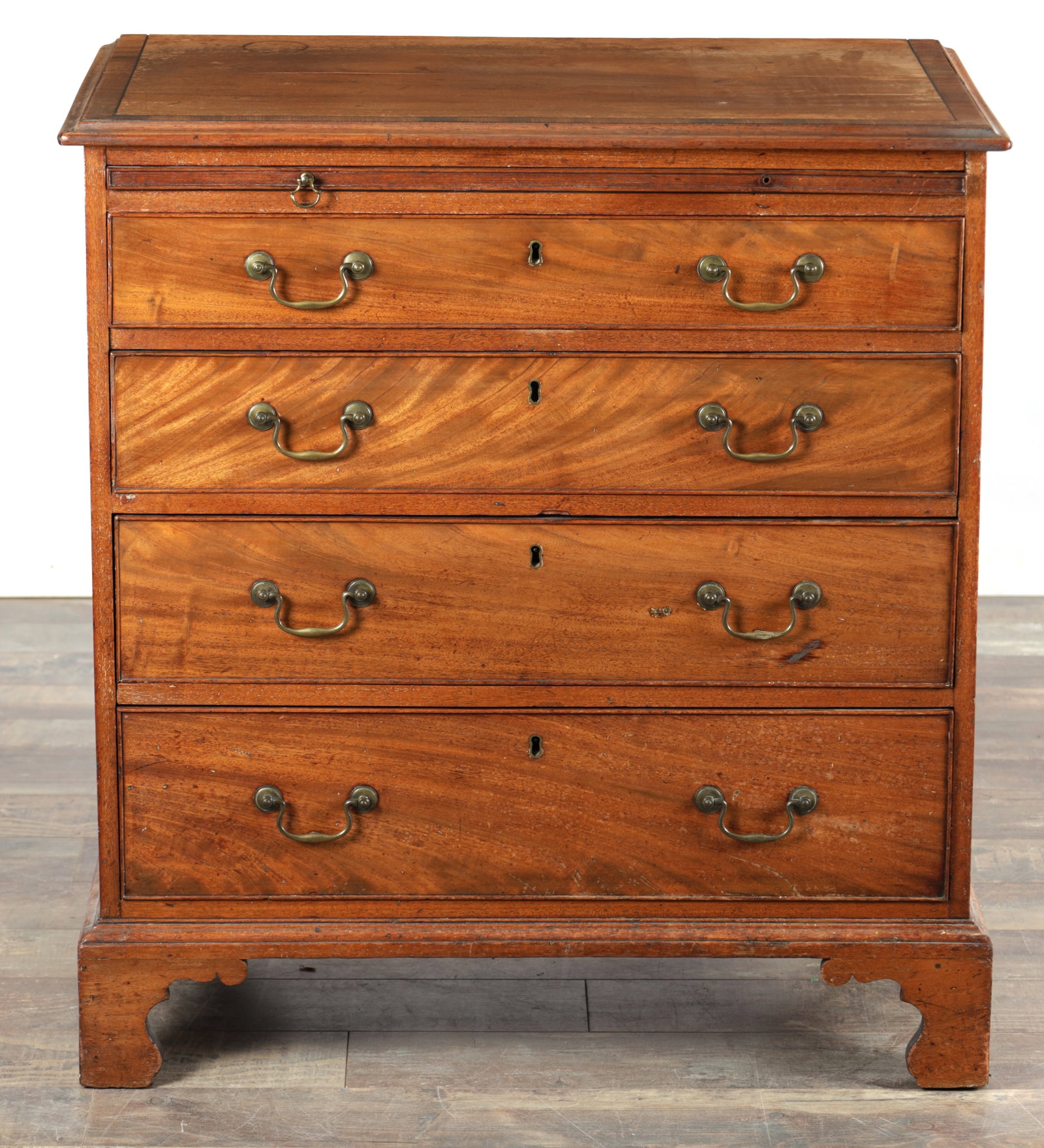 A GEORGE III MAHOGANY CHEST WITH BRUSHING SLIDE (1 of 9)