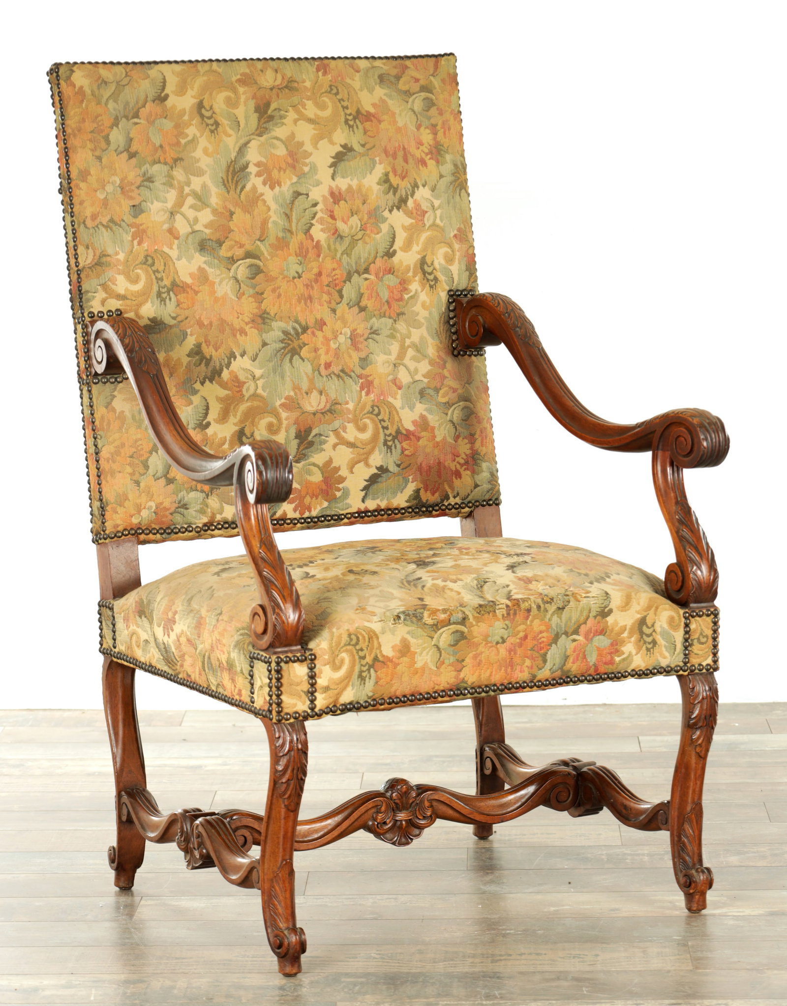 A 19TH CENTURY FRENCH CARVED WALNUT UPHOLSTERED OPEN ARMCHAIR (1 of 9)