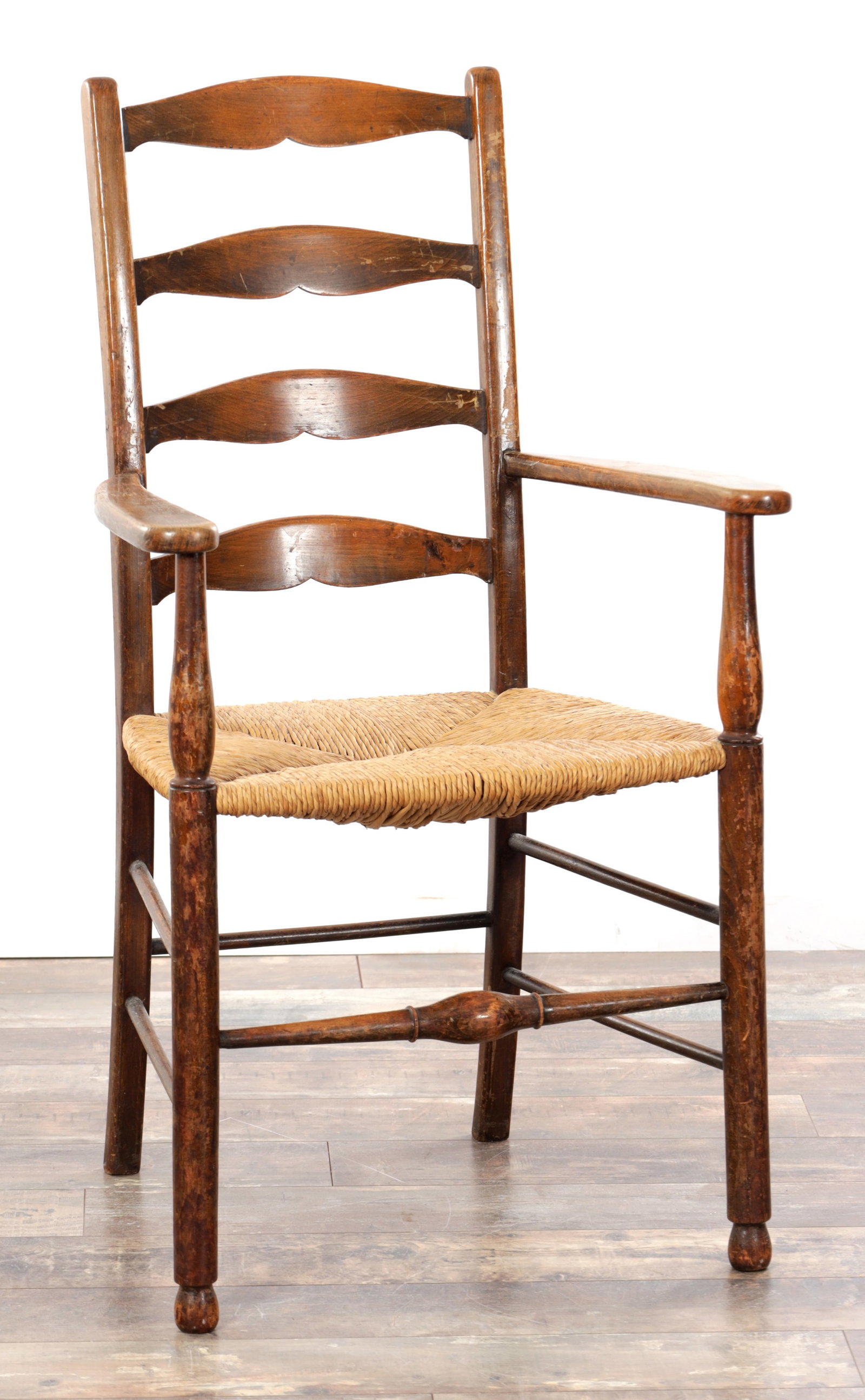 A 19TH CENTURY STAINED FRUITWOOD LADDER BACK ARMCHAIR (1 of 7)
