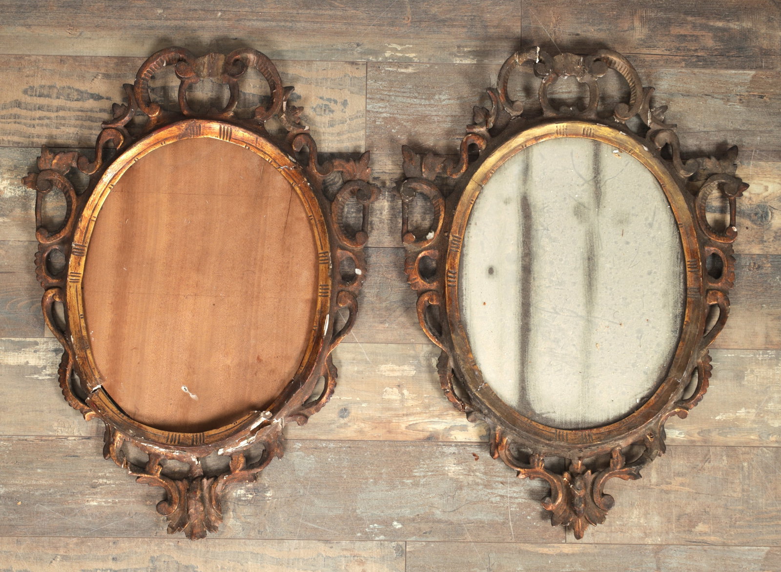 A PAIR OF 18TH CENTURY CARVED GILT WOOD HANGING MIRRORS IN NEED OF RESTORATION (1 of 7)