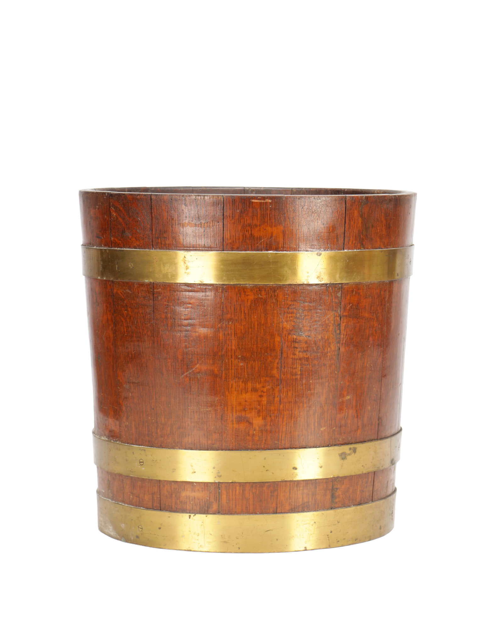 A 19TH CENTURY BRASS-BOUND OAK BUCKET: A 19TH CENTURY BRASS-BOUND OAK BUCKET of coopered staved construction with slightly tapering sides, fitted with two broad brass bands and a flat base.