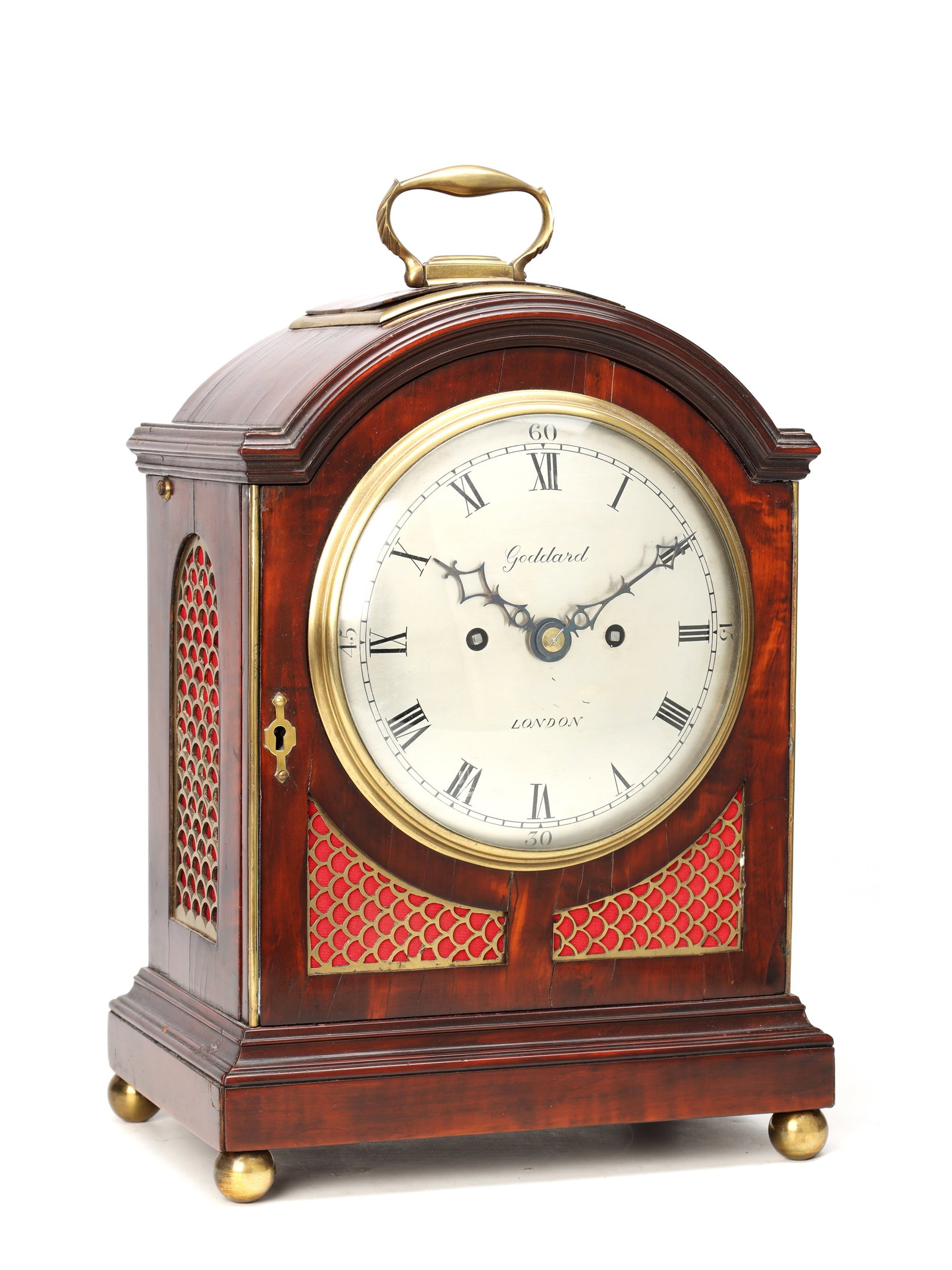GODDARD, LONDON. A REGENCY MAHOGANY DOUBLE FUSEE BRACKET CLOCK: GODDARD, LONDON. A REGENCY MAHOGANY DOUBLE FUSEE BRACKET CLOCK having a pad top case with brass carrying handle, brass fishscale sound frets and brass ball feet enclosing a 7' silvered dial signed God
