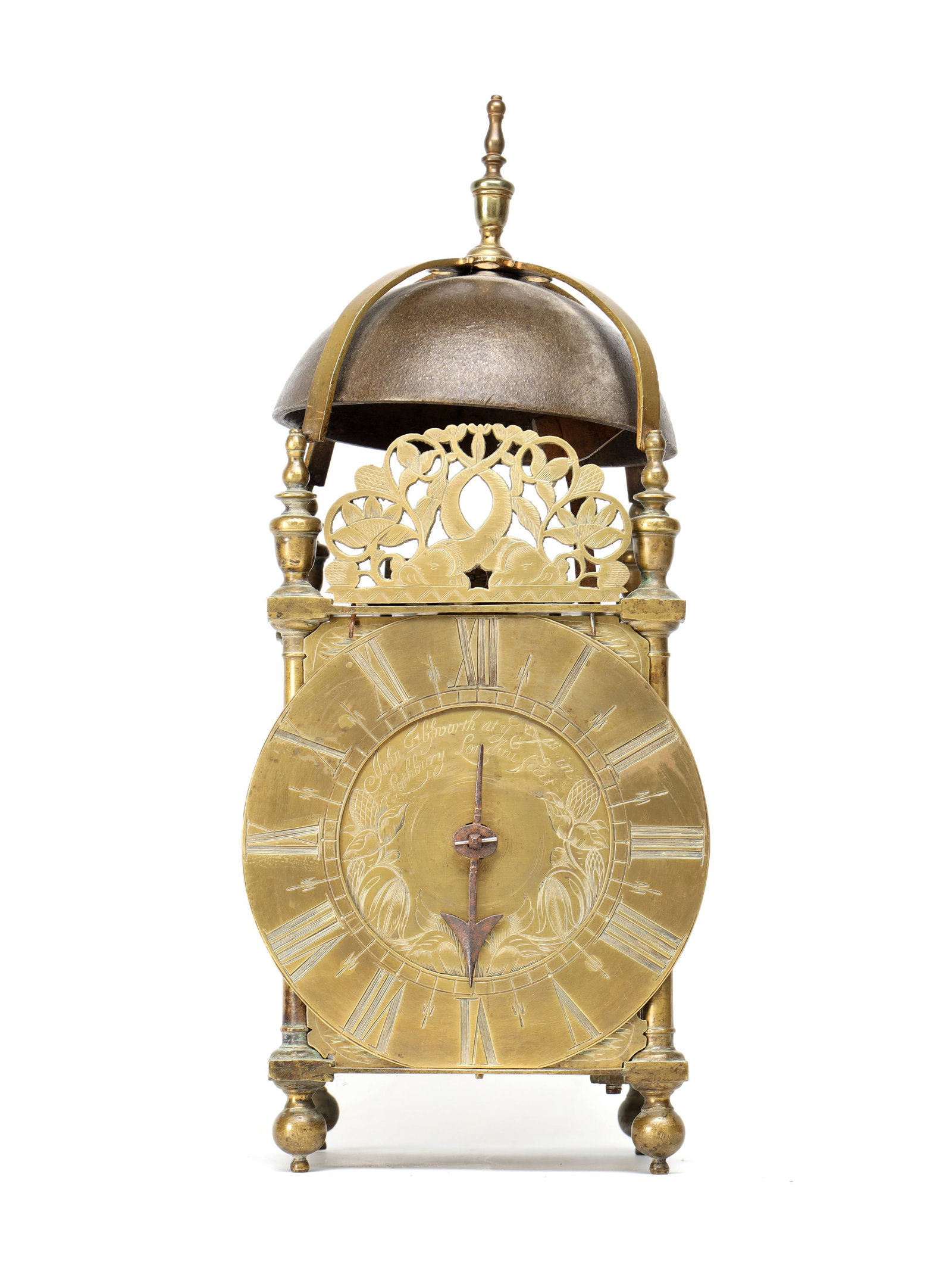 JOHN EBSWORTH, LONDON. AN ENGLISH CHARLES II STRIKING LANTERN CLOCK: JOHN EBSWORTH, LONDON. AN ENGLISH CHARLES II STRIKING LANTERN CLOCK the brass posted frame with finials, pierced frets and domed bell, enclosing a 6 1/2' Roman chapter ring and tulip-engraved centre w