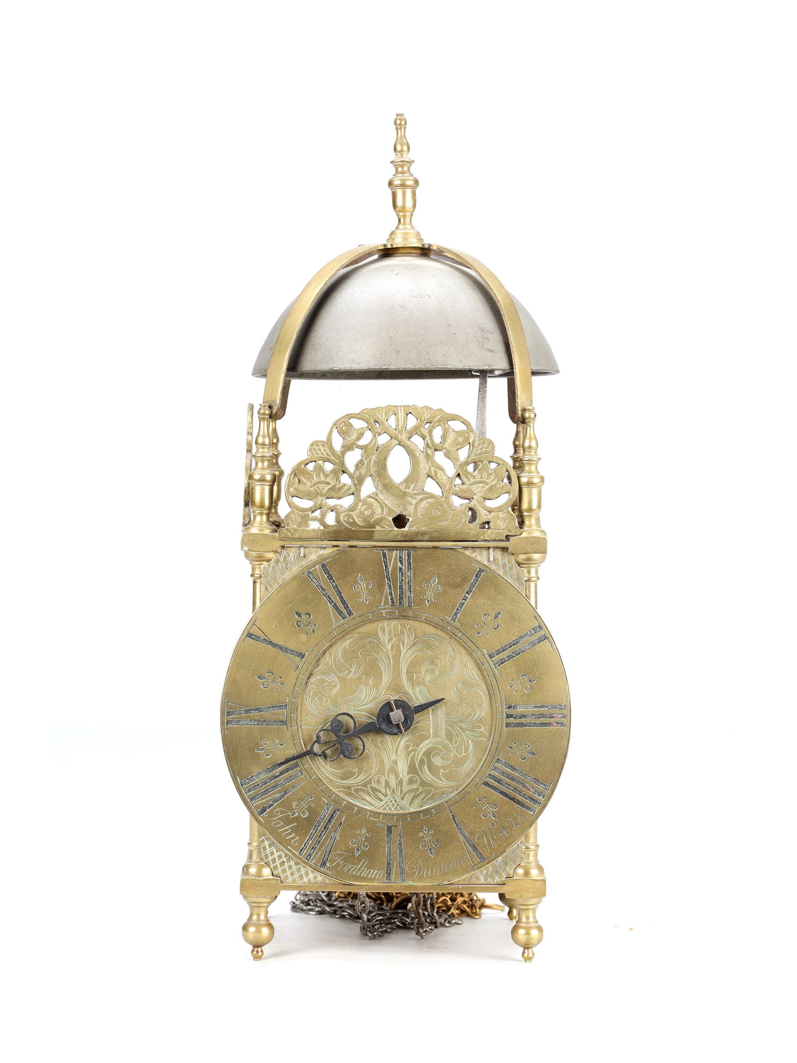 JOHN FORDHAM, DUNMOW, ESSEX. NO 428. A LATE 17TH CENTURY BRASS LATERN CLOCK: JOHN FORDHAM, DUNMOW, ESSEX. NO 428. A LATE 17TH CENTURY BRASS LATERN CLOCK the brass case with turned finials, pierced scroll front fret, strapped arched supports and a domed bell on turned feet encl