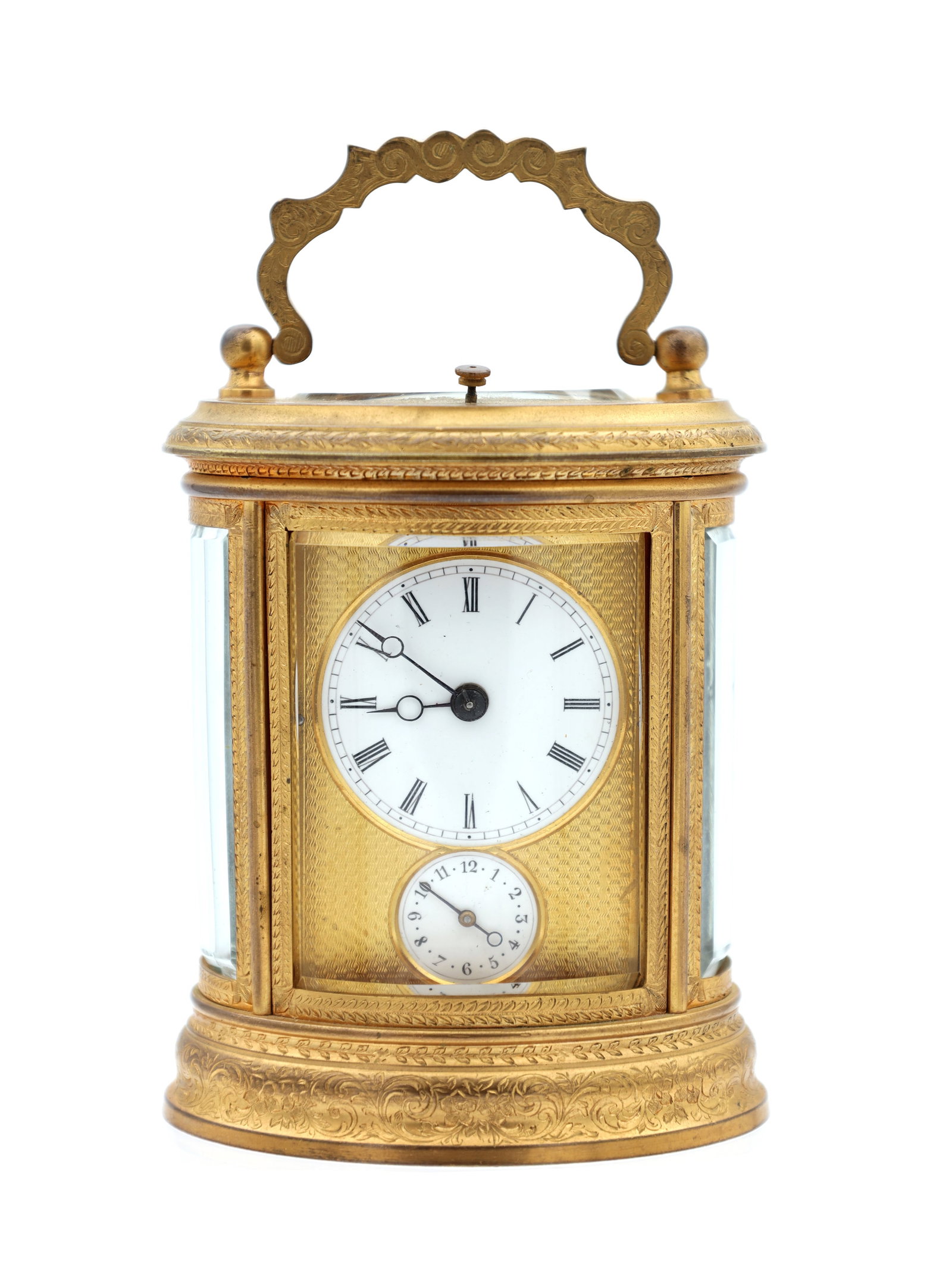 JOSEPH SOLDANO. A LATE 19TH CENTURY FRENCH ENGRAVED GILT METAL REPEATING CARRIAGE CLOCK: JOSEPH SOLDANO. A LATE 19TH CENTURY FRENCH ENGRAVED GILT METAL REPEATING CARRIAGE CLOCK having an oval case with scrolling swing handle and bevelled glass panels, enclosing an engine-turned mask and w