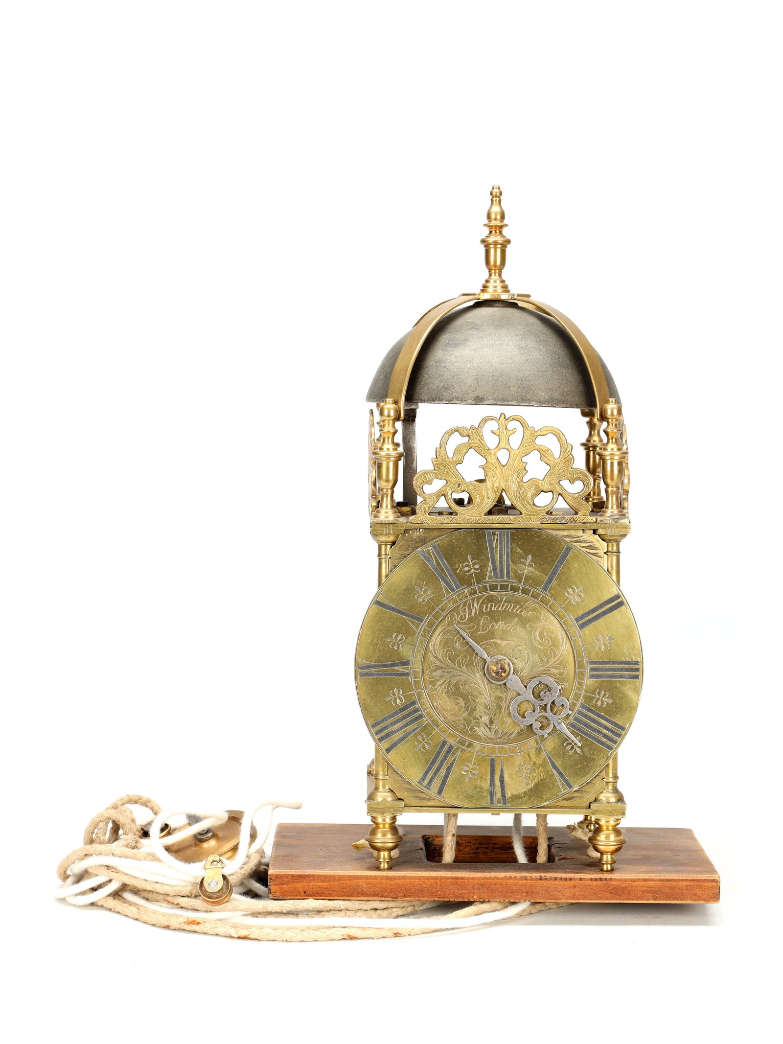 JOSEPH WINDMILLS, LONDON. A WILLIAM AND MARY STRIKING LANTERN CLOCK: JOSEPH WINDMILLS, LONDON. A WILLIAM AND MARY STRIKING LANTERN CLOCK with a 6.5' Roman chapter ring with scroll-engraved centre, two-train weight-driven movement with anchor escapement, striking on a b