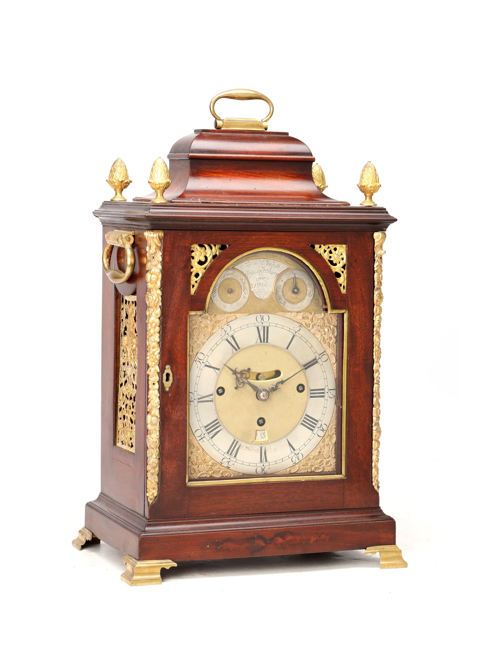 WILLIAM CREAK, LONDON. A GEORGE III ORMOLU MOUNTED MAHOGANY QUARTER CHIMING BRACKET CLOCK: WILLIAM CREAK, LONDON. A GEORGE III ORMOLU MOUNTED MAHOGANY QUARTER CHIMING BRACKET CLOCK with a caddy top surmounted by a brass carrying handle and four gilt finials, the case with pierced gilt sound