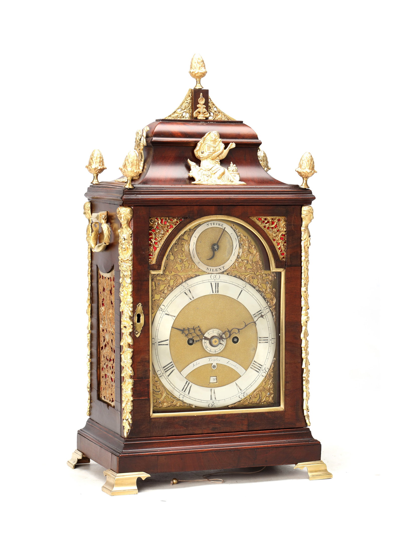 JOHN TAYLOR, LONDON. A GEORGE III ORMOLU MOUNTED MAHOGANY VERGE BRACKET CLOCK WITH ALARM: JOHN TAYLOR, LONDON. A GEORGE III ORMOLU MOUNTED MAHOGANY VERGE BRACKET CLOCK WITH ALARM the bell-top mahogany case with ormolu finials and figure mount, applied ormolu mounts to the angles, pierced s
