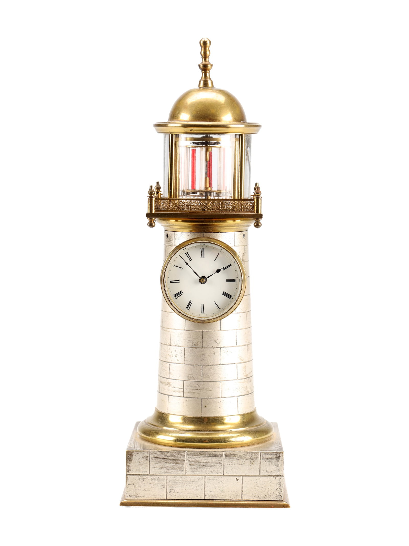 GUILMET, PARIS. A LATE 19TH CENTURY BRASS AND SILVERED METAL AUTOMATION LIGHTHOUSE MANTEL CLOCK: GUILMET, PARIS. A LATE 19TH CENTURY BRASS AND SILVERED METAL AUTOMATION LIGHTHOUSE MANTEL CLOCK of tapering cylindrical tower form with simulated ashlar stonework and moulded brass plinth on a square 