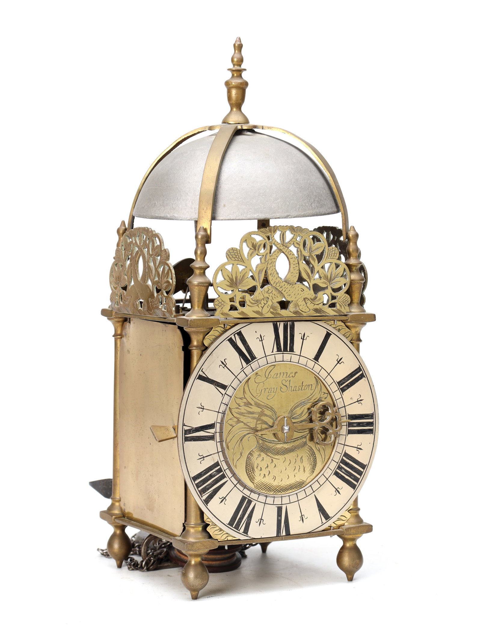 JAMES GRAY OF SHASTON (SHAFTESBURY) A RARE LATE 17TH CENTURY PROVINCIAL BRASS LANTERN CLOCK: A RARE LATE 17TH CENTURY PROVINCIAL BRASS LANTERN CLOCK BY JAMES GRAY OF SHASTON (SHAFTESBURY), circa 1690–1695, with strapped bell surmounted by an urn finial above pierced dolphin and foliate fret