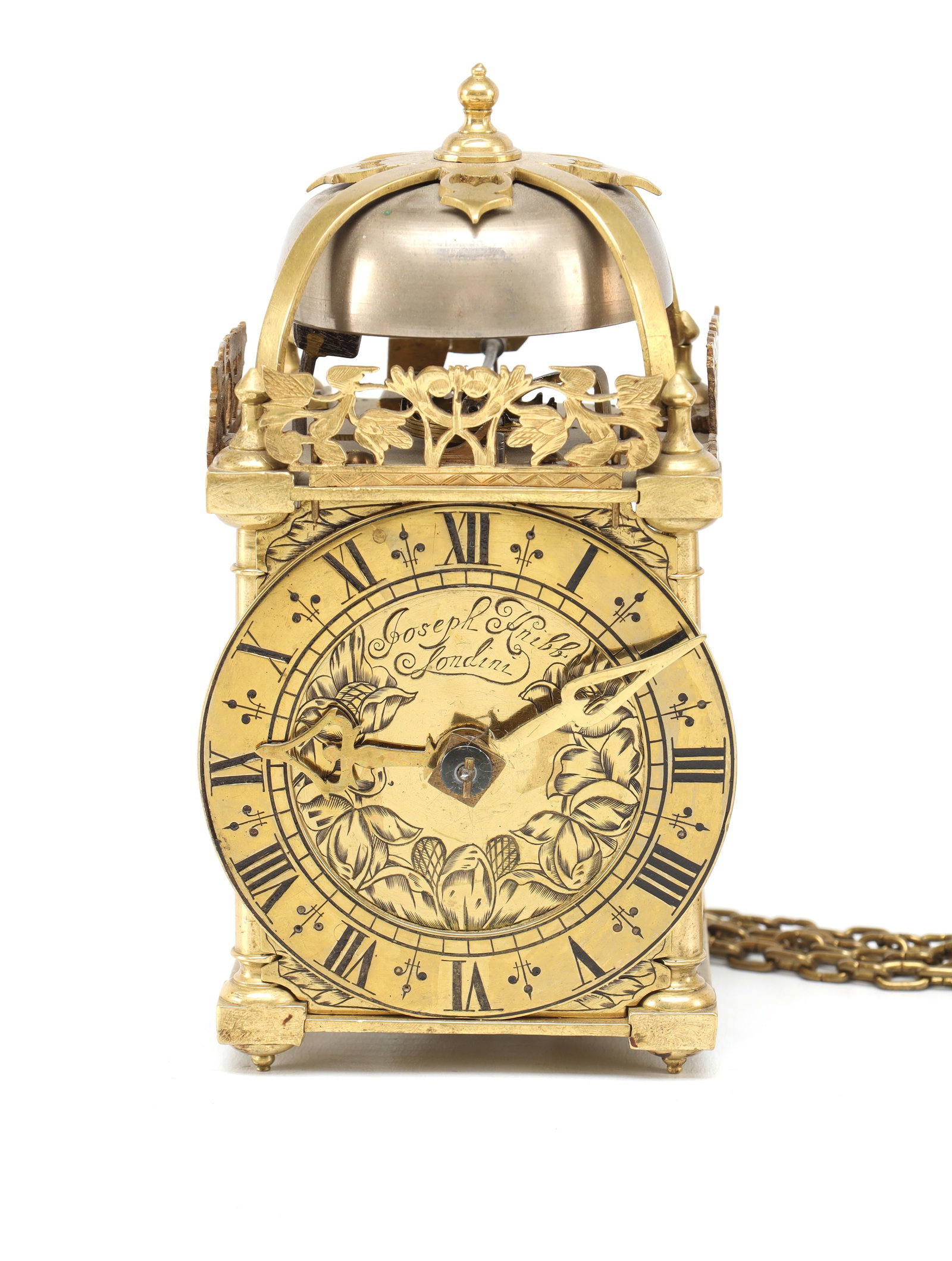 JOSEPH KNIBB, LONDON. A WILLIAM AND MARY MINIATURE STRIKING VERGE LANTERN CLOCK: JOSEPH KNIBB, LONDON. A WILLIAM AND MARY MINIATURE STRIKING VERGE LANTERN CLOCK brass case with domed bell surmounted by a finial between strapped uprights, pierced foliate frets, turned corner column