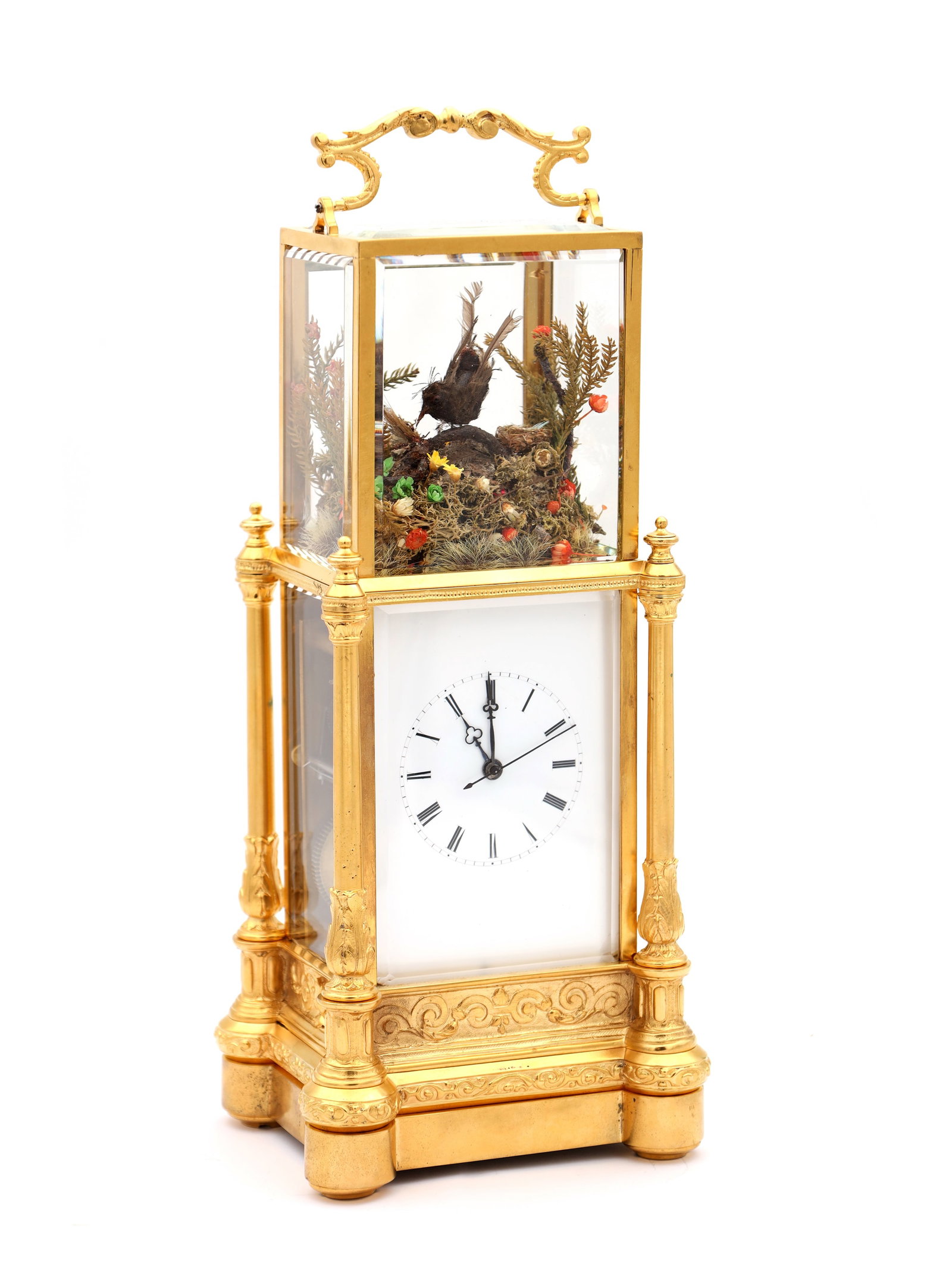 JACQUES FRERES. A LATE 19TH CENTURY FRENCH SINGING BIRD AUTOMATION CARRIAGE CLOCK: JACQUES FRERES. A LATE 19TH CENTURY FRENCH SINGING BIRD AUTOMATION CARRIAGE CLOCK having a gilt brass glazed case with turned columns and acanthus leaf bases enclosing a white enamel Roman dial below 
