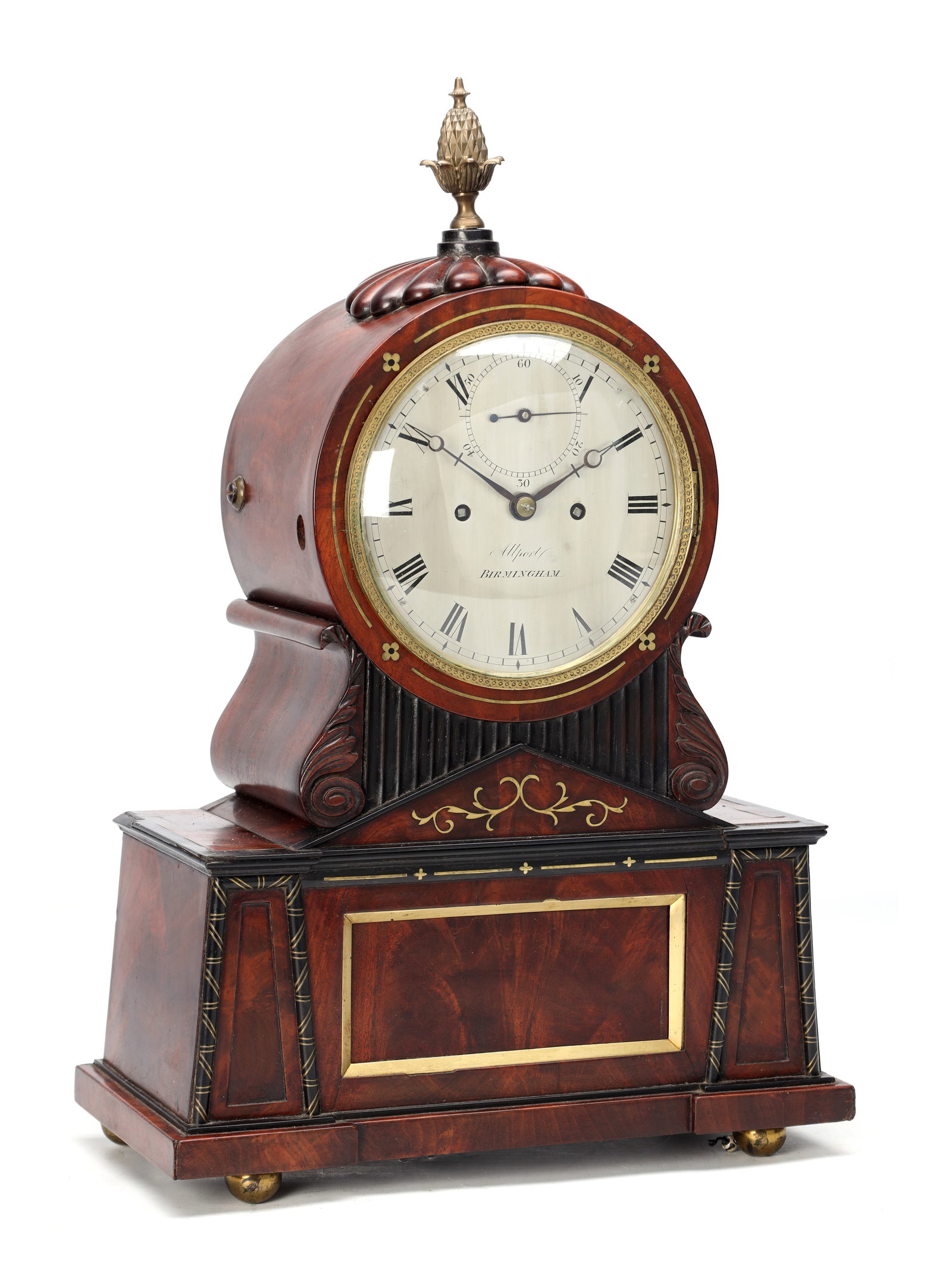 ALLPORT, BIRMINGHAM A REGENCY FIGURED MAHOGANY AND BRASS INLAID STRIKING BRACKET CLOCK: ALLPORT, BIRMINGHAM A REGENCY FIGURED MAHOGANY AND BRASS INLAID STRIKING BRACKET CLOCK having an architectural case with carved scroll supports, brass line inlay and ball feet, enclosing a 6' silvered