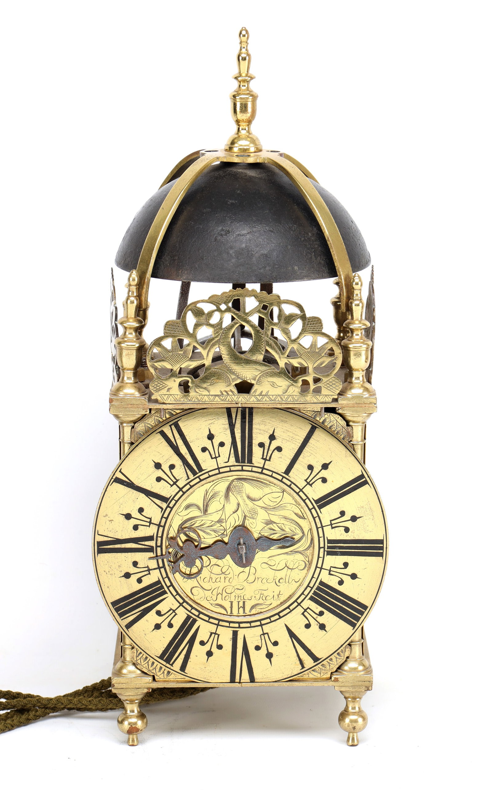 RICHARD BRECKEL, HOLMES, LANCASTER A RARE LATE 17TH CENTURY BRASS LANCASHIRE STRIKING LANTERN CLOCK: RICHARD BRECKEL, HOLMES, LANCASTER A RARE LATE 17TH CENTURY BRASS LANCASHIRE STRIKING LANTERN CLOCK having a posted frame with turned finials and pierced foliate frets surmounted by a domed iron bell,