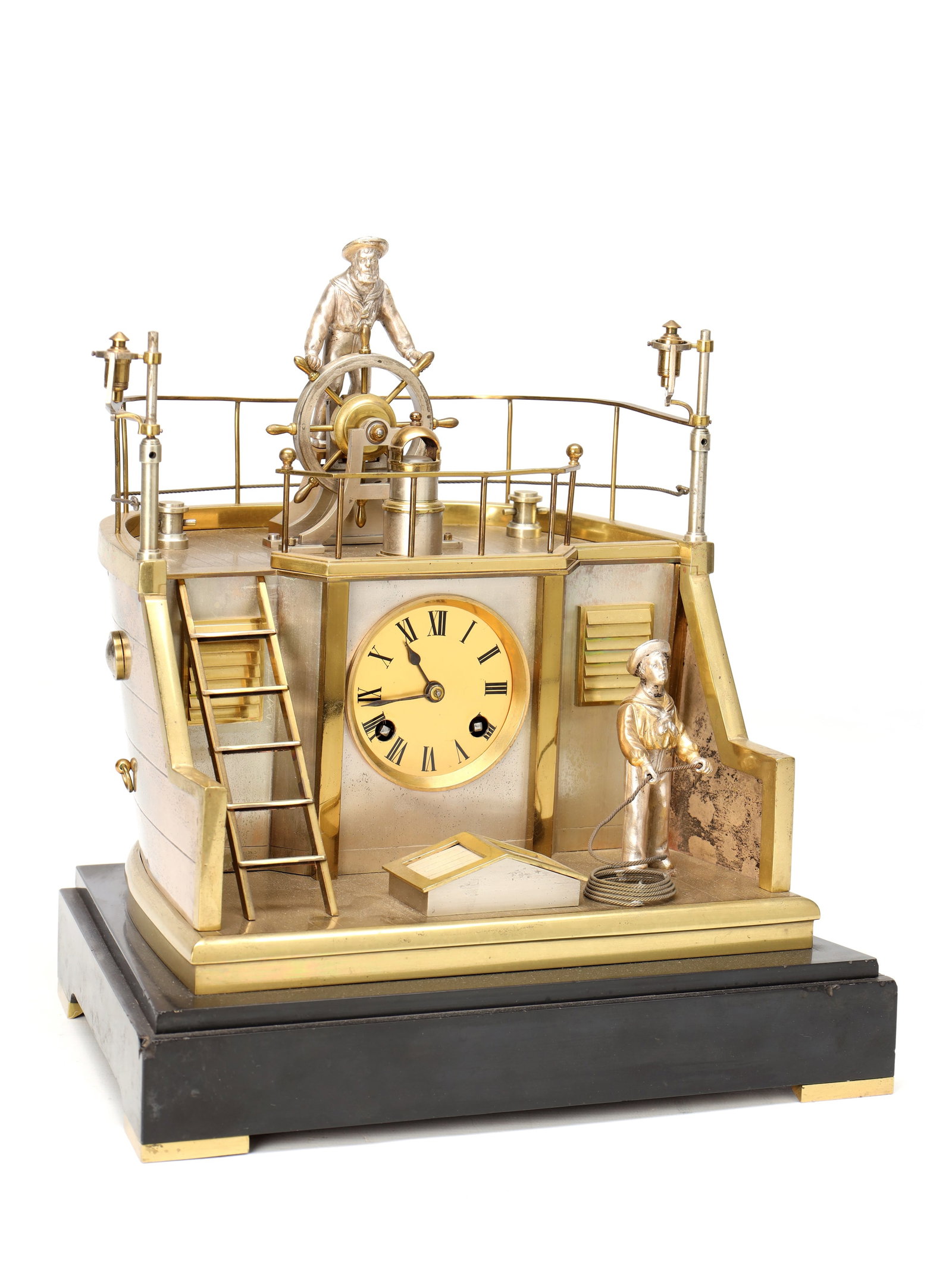 GUILMET, PARIS. A LATE 19TH CENTURY FRENCH INDUSTRIAL AUTOMATON 'HELMSMAN' TABLE CLOCK: GUILMET, PARIS. A LATE 19TH CENTURY FRENCH INDUSTRIAL AUTOMATON 'HELMSMAN' TABLE CLOCK the case modelled as the stern of a ship with rocking helmsman automaton, raised on a black marble base, enclosin