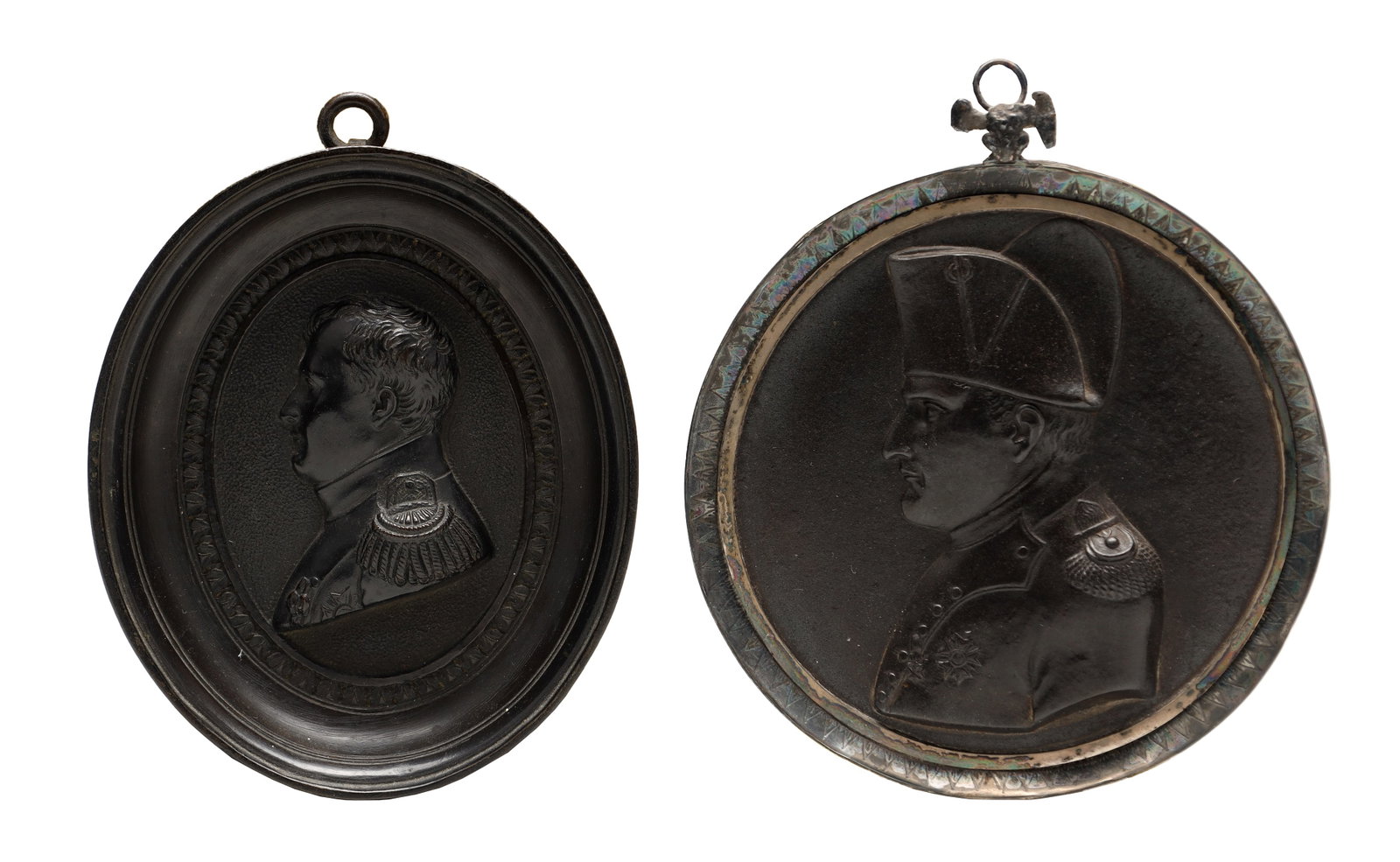 TWO 19TH CENTURY BRONZE MINIATURE PORTRAIT PLAQUES OF NAPOLEON BONAPARTE: TWO 19TH CENTURY BRONZE MINIATURE PORTRAIT PLAQUES OF NAPOLEON BONAPARTE of oval and circular form in low relief with profile busts in uniform, each within a moulded frame with ring suspension. (12cm 