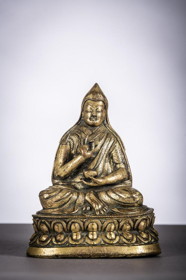 Gilt sculpture with engraved decoration of a lama, (1 of 6)