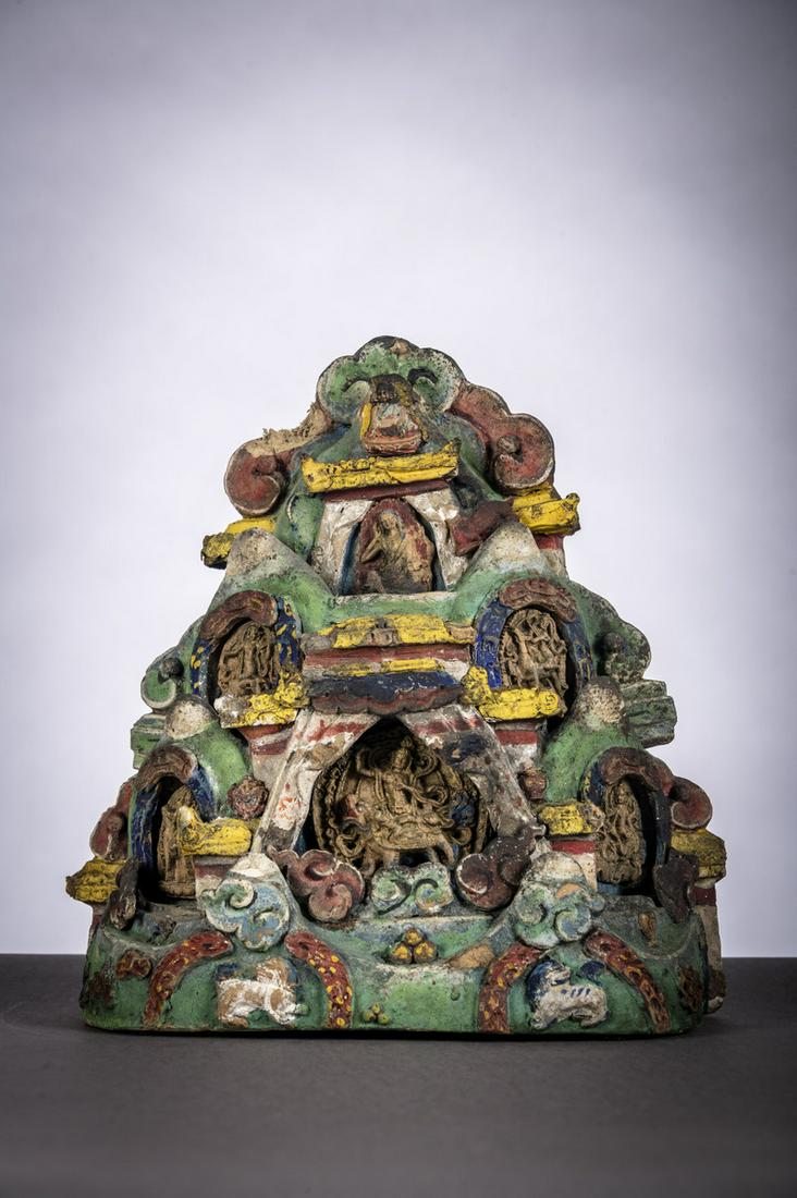 Tibetan sculpture in polychromed clay with 'Tsatsa' (1 of 3)