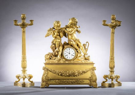 Three-piece Charles X clock set in gilt bronze 'putti': Three-piece Charles X clock set in gilt bronze 'putti' (67cm) (63x51x18cm)