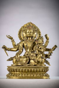 Gilt bronze sculpture of a Hindu god with consort Nepal