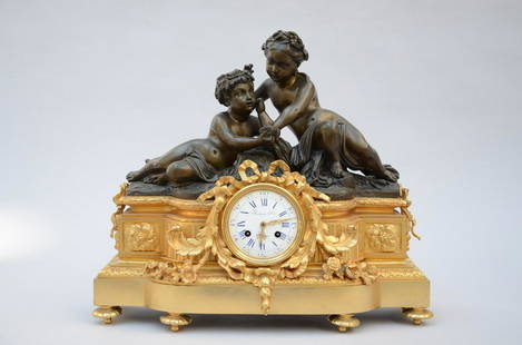 Gilt bronze clock 'putti': Gilt bronze clock 'putti' by Raingo Frères à Paris (44x50x15cm)