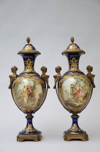 A pair of Sèvres faience vases with bronze mounts (h: A pair of Sèvres faience vases with bronze mounts (h 60cm) (*)