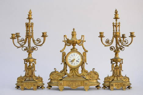 A gilt bronze clock set in Louis XVI style (53x44x16cm): A gilt bronze clock set in Louis XVI style (53x44x16cm) (h68cm)