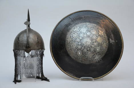 Engraved Indo-Persian helmet and a shield (h28 dia46cm): Engraved Indo-Persian helmet and a shield (h28 dia46cm)