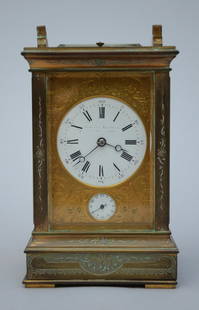 A bronze travel clock 19th century (16x10x8cm) (*): A bronze travel clock 19th century (16x10x8cm) (*)