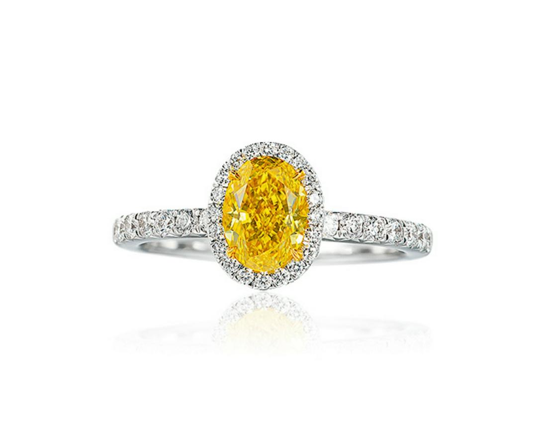 A 1.02 CARAT FANCY VIVID YELLOW DIAMOND AND DIAMOND RING (1 of 1)
