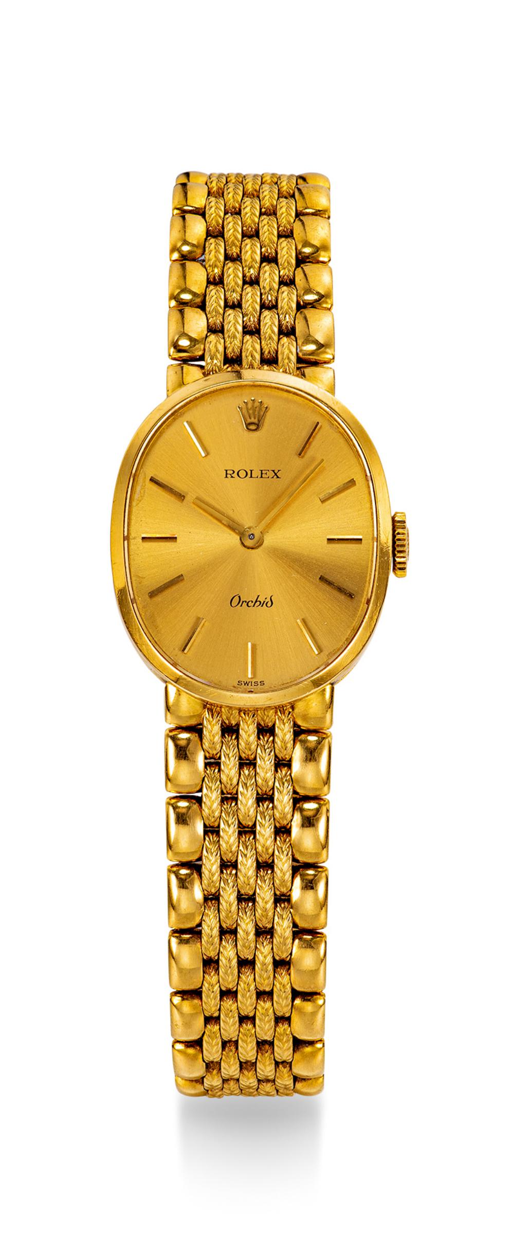 A YELLOW GOLD MECHANICAL BRACELET WATCH (1 of 1)