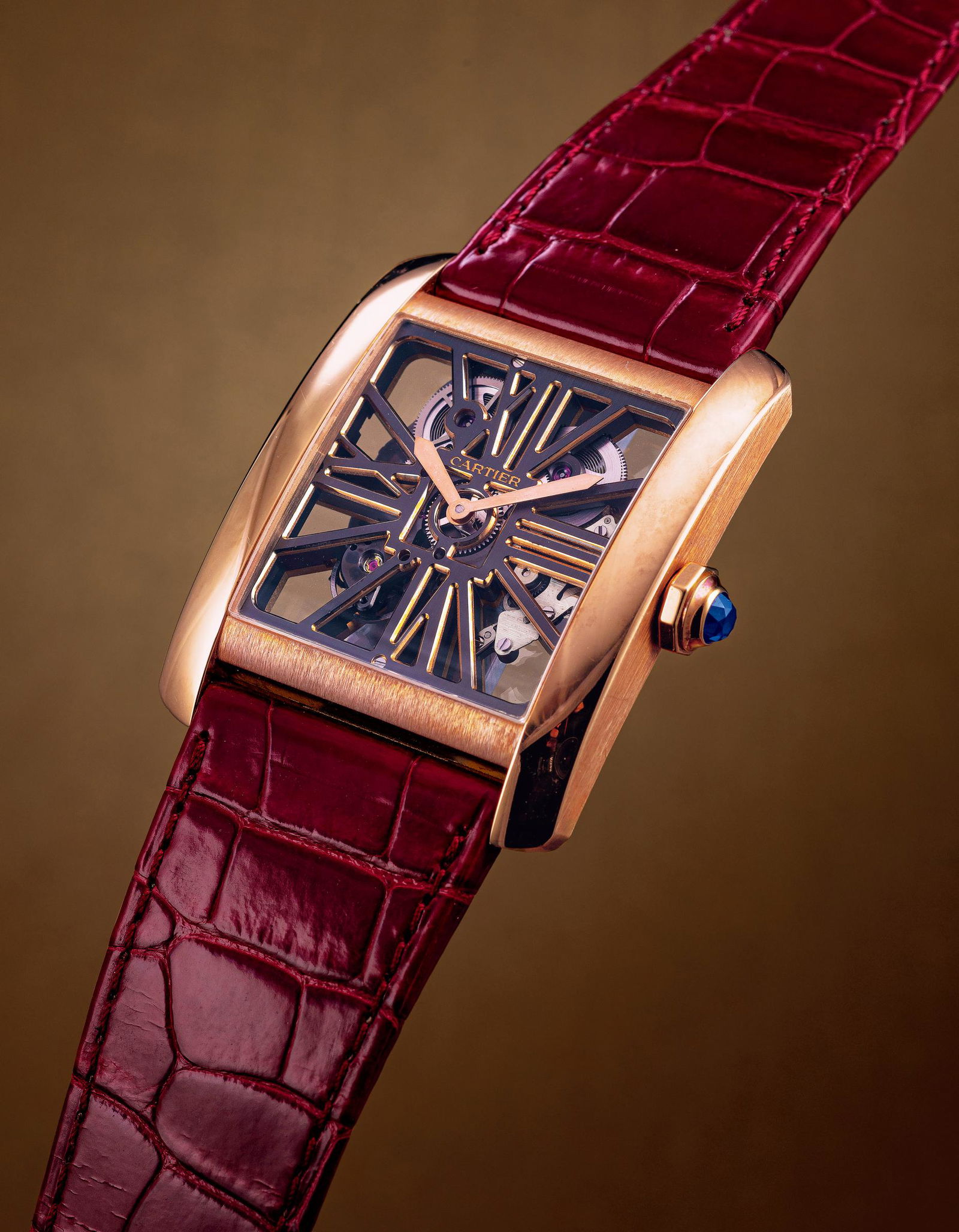 A ROSE GOLD AND SAPPHIRE-SET MECHANICAL WRISTWATCH (1 of 1)