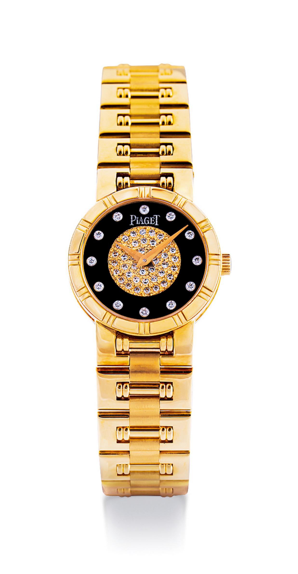 A YELLOW GOLD AND DIAMOND-SET MECHANICAL BRACELET WATCH (1 of 1)