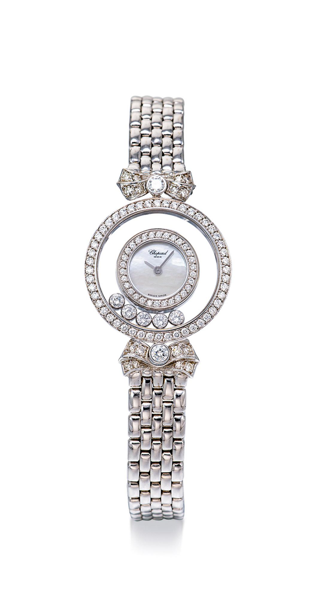 A WHITE GOLD AND DIAMOND-SET BRACELET WATCH (1 of 1)