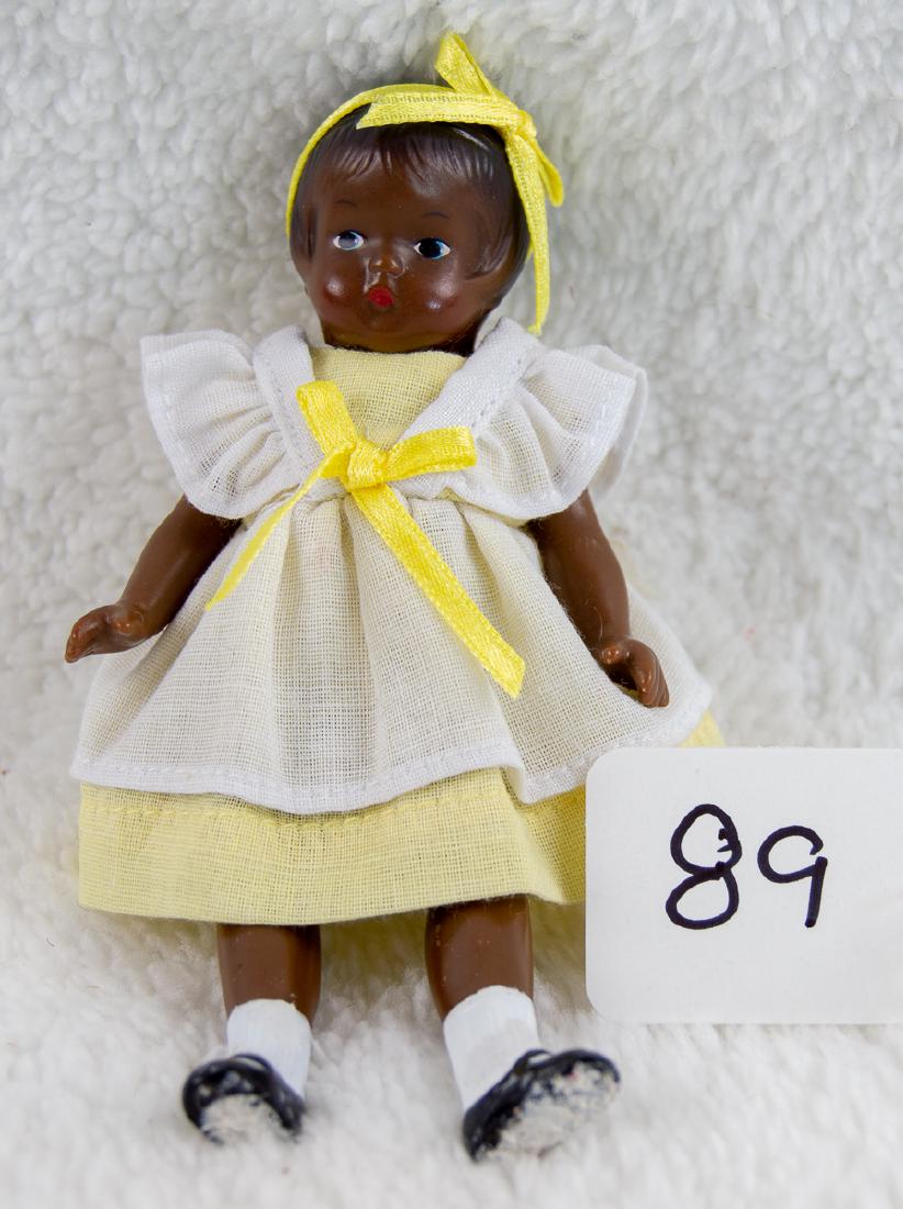 Effanbee Wee Patsy African-American Doll: Vintage 5.5" Effanbee Wee Patsy African-American Doll. Arms need to be restrung white tacky material has been used on shoes at one time. Good condition.