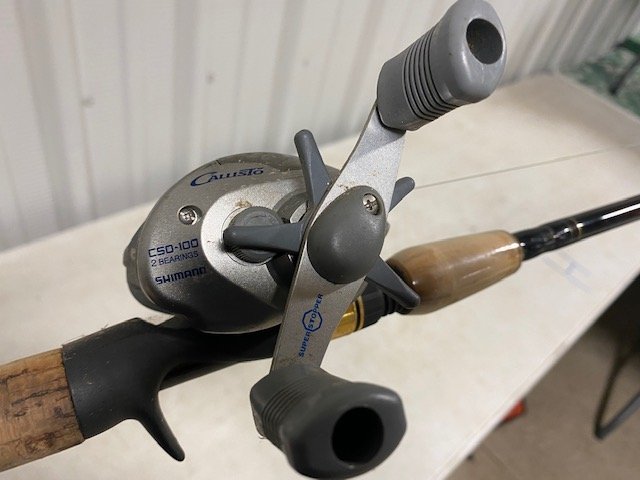 shimano reel on daiwa fishing pole: shimano