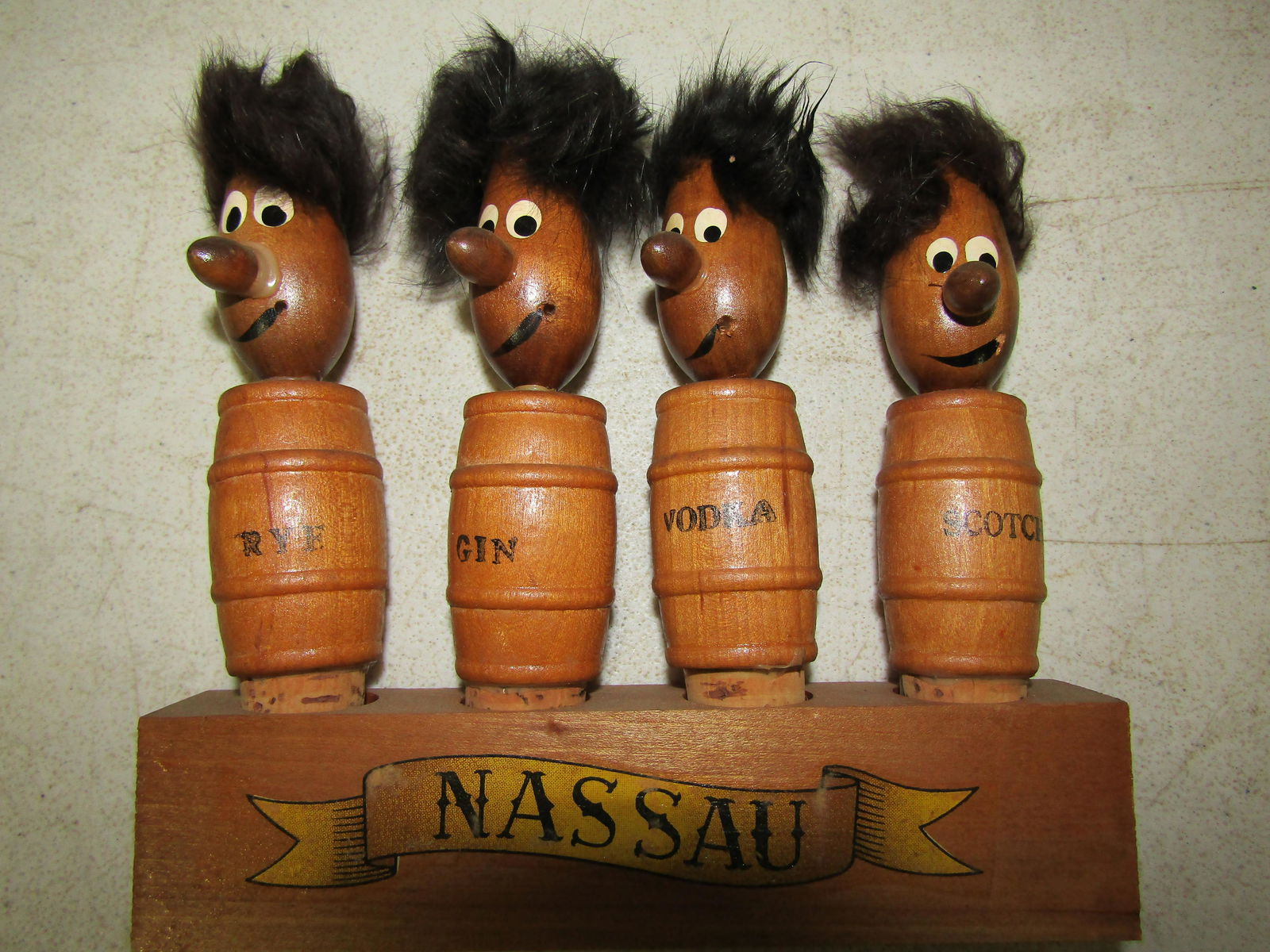 Liquor Flasks and Stoppers: This is a flat containing Jim Beam Flask, Jack Daniels Flask, Stanley Flask, Scottland 2005 Flask and set of 4 cork Bottle Stoppers